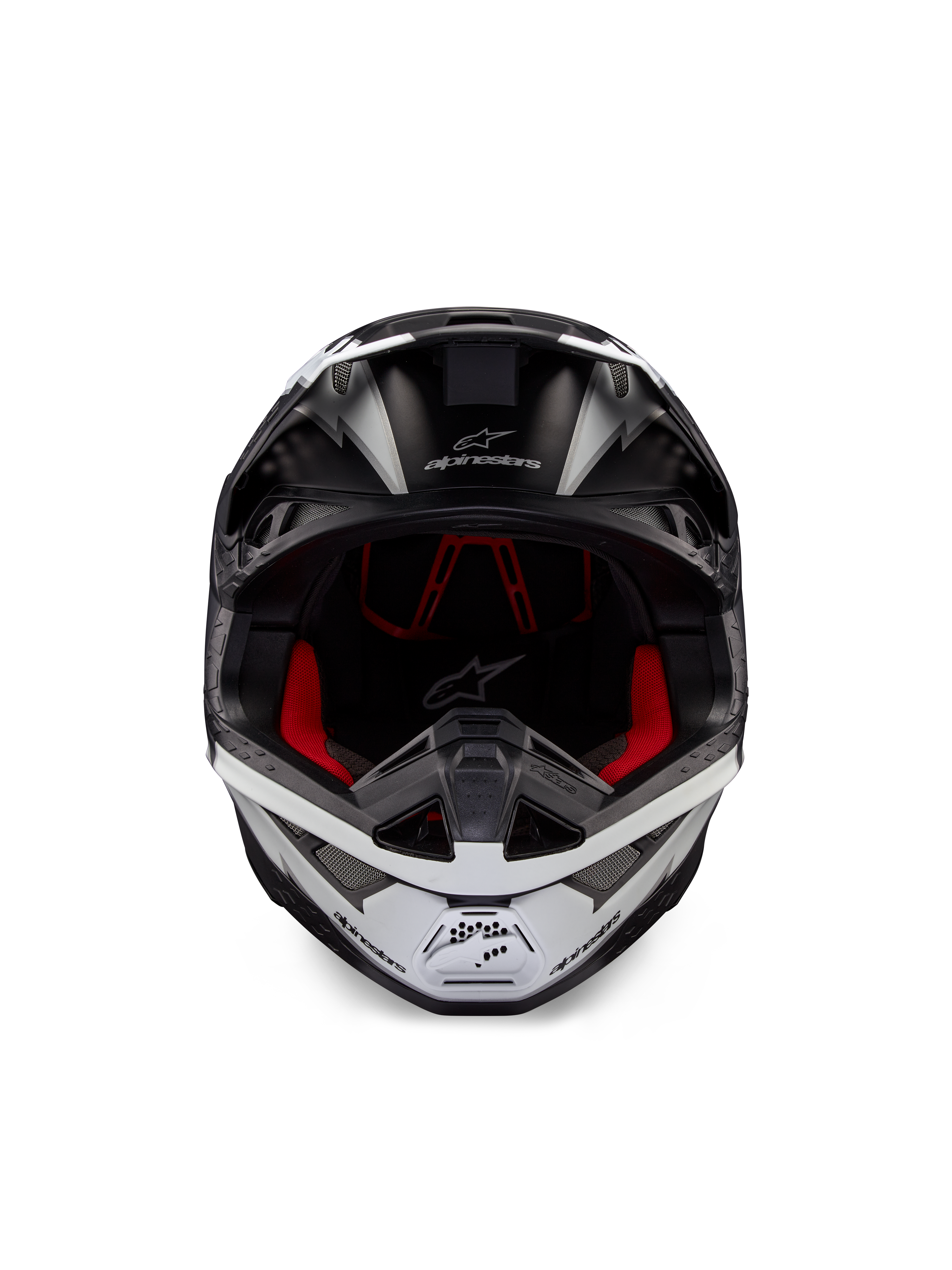 Alpinestars Supertech M10 Ampress Helmet, Motocross Helmet, Black and White Matte, front view with red interior lining, aerodynamic shell featuring ventilation ports and Alpinestars logo