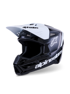Capacete Alpinestars S-M3 Radium, capacete de motocross, preto, branco e cinzento brilhante, com uma viseira branca com marca a preto, calota preta brilhante com logótipos Alpinestars brancos proeminentes e detalhes gráficos cinzentos, design aerodinâmico para competição todo-o-terreno