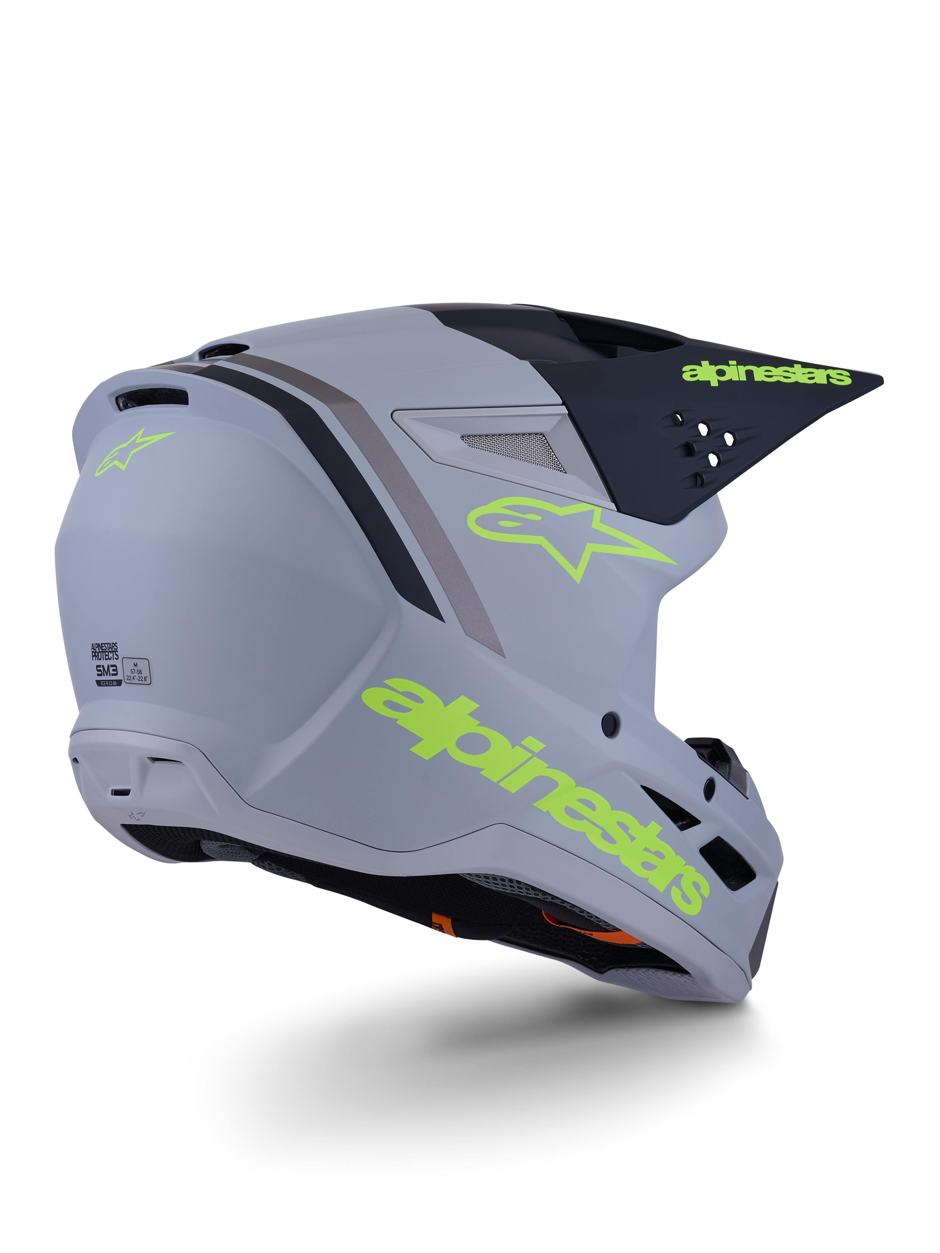 Capacete Alpinestars S-M3 Radium, capacete de motocross, cinzento, preto e amarelo fluo mate, design integral com calota angular, viseira proeminente e aberturas de ventilação, acabamento mate com grafismos arrojados
