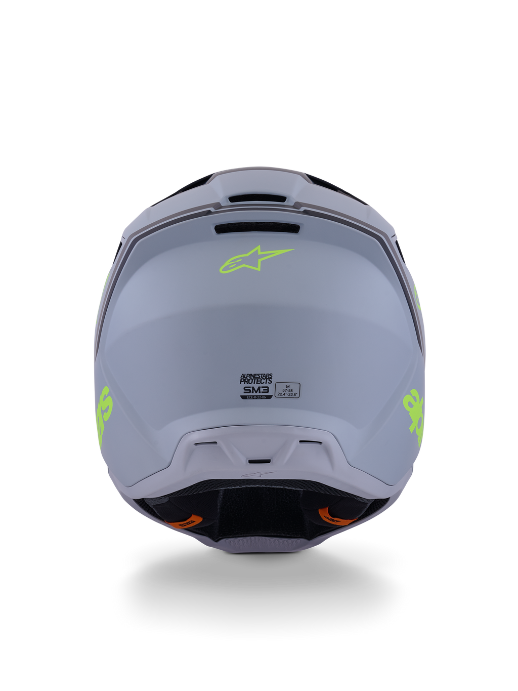Capacete Alpinestars S-M3 Radium, capacete de motocross, verde, preto e amarelo fluo mate, vista traseira exibindo o acabamento baço da calota, logótipo Alpinestars em amarelo néon e detalhes da certificação ECE 22.06