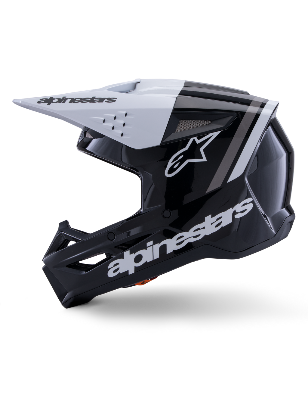 Capacete Alpinestars S-M3 Radium ECE 22.06, vista de perfil lateral, acabamento brilhante em preto e branco, riscas de corrida cinzentas, logótipo Alpinestars branco na lateral e na zona do queixo, design ventilado para motocross e enduro