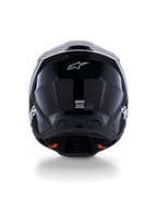 Alpinestars S-M3 Radium Helmet ECE 22.06, capacete de motocross, preto, branco e cinzento brilhante, vista traseira com acabamento preto brilhante, logótipo da estrela Alpinestars, aberturas de ventilação e etiqueta de certificação ECE