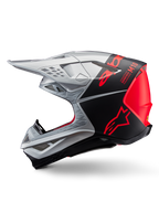 Alpinestars Supertech M10 Flood Helmet, Motocross Helmet, Silver and Black with Fluorescent Orange accents, side profile, sleek aerodynamic design with ventilation ports, matte and glossy finish, professional off-road racing protection