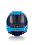 Capacete Alpinestars Supertech M10 Flood, capacete de motocross, azul metálico e azul médio com fibra de carbono preta, vista traseira exibindo a textura de carbono 3K, logótipos de estrela brancos, autocolante MIPS e saídas de ventilação
