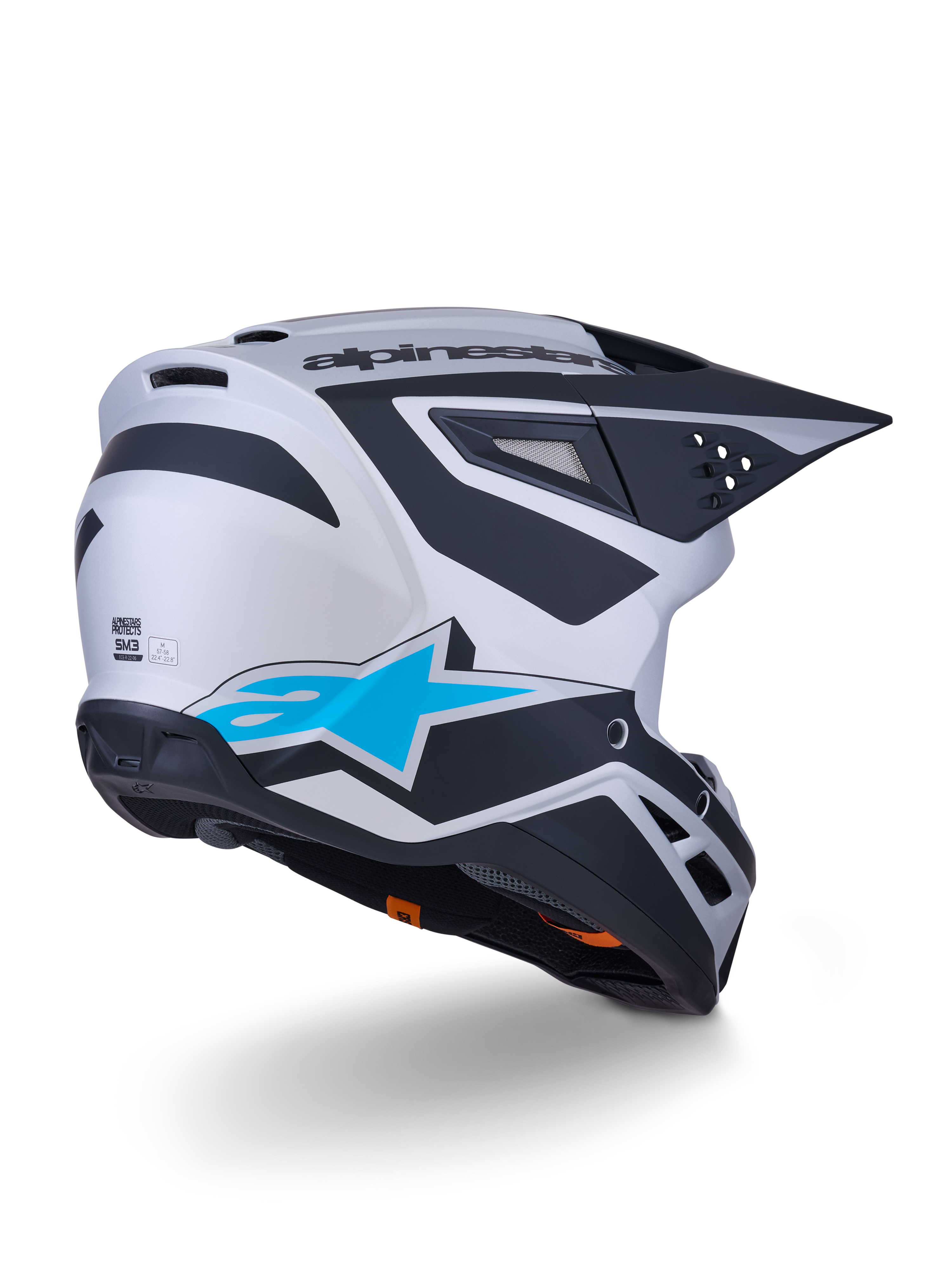 Alpinestars S-M3 Heat Helmet ECE 22.06, Motocross Helmet, Silver Blue and Black Matt, rear-view featuring large blue star logo and black angular designs, aerodynamic shell with ventilation ports, high-performance off-road racing protection