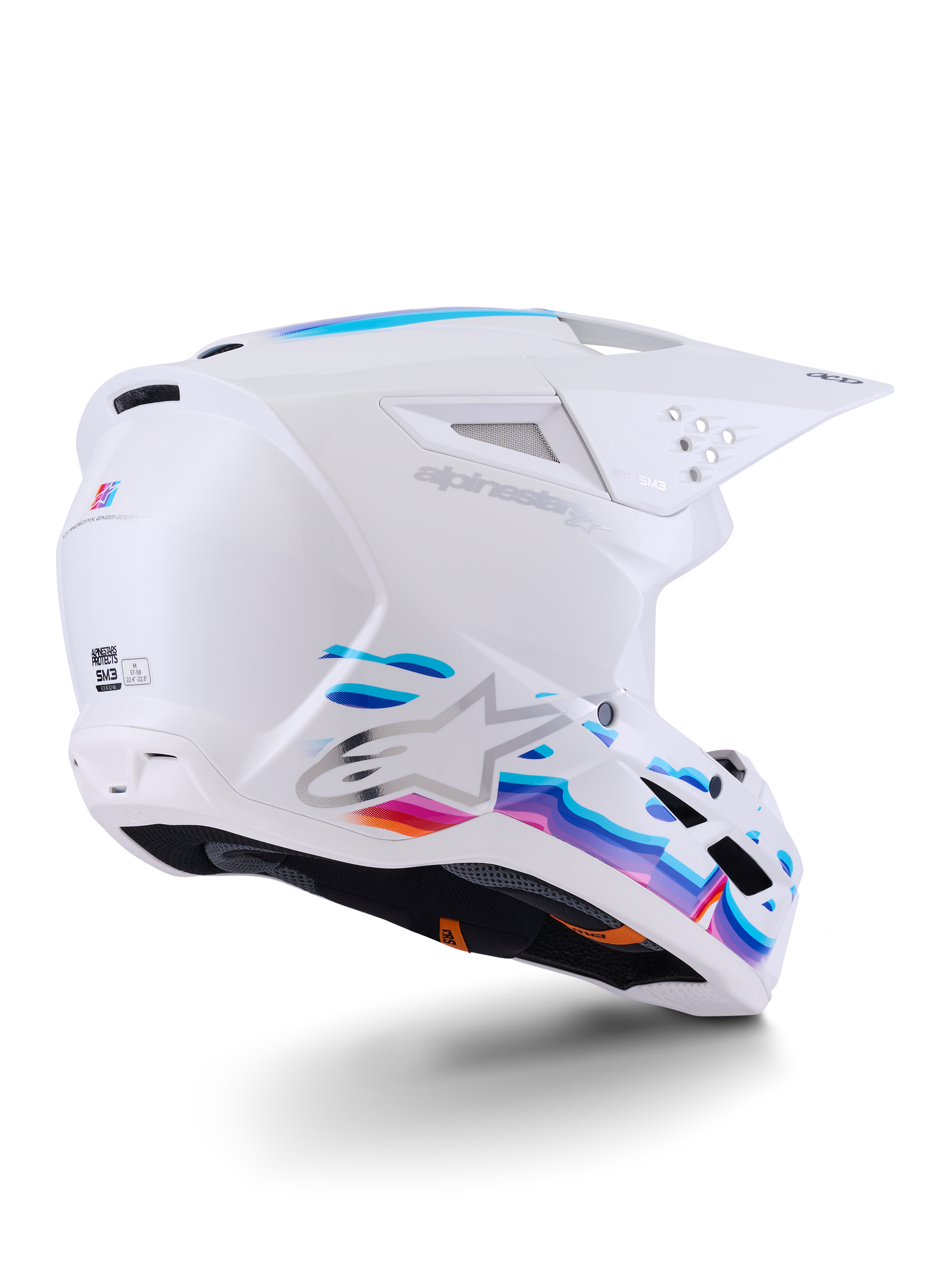 Capacete Alpinestars S-M3 Force OCD, capacete de motocross, branco brilhante com grafismos fluidos em azul e roxo vibrantes, com logótipo Astar prateado e entradas de ventilação laterais, design de calota aerodinâmico para corridas off-road