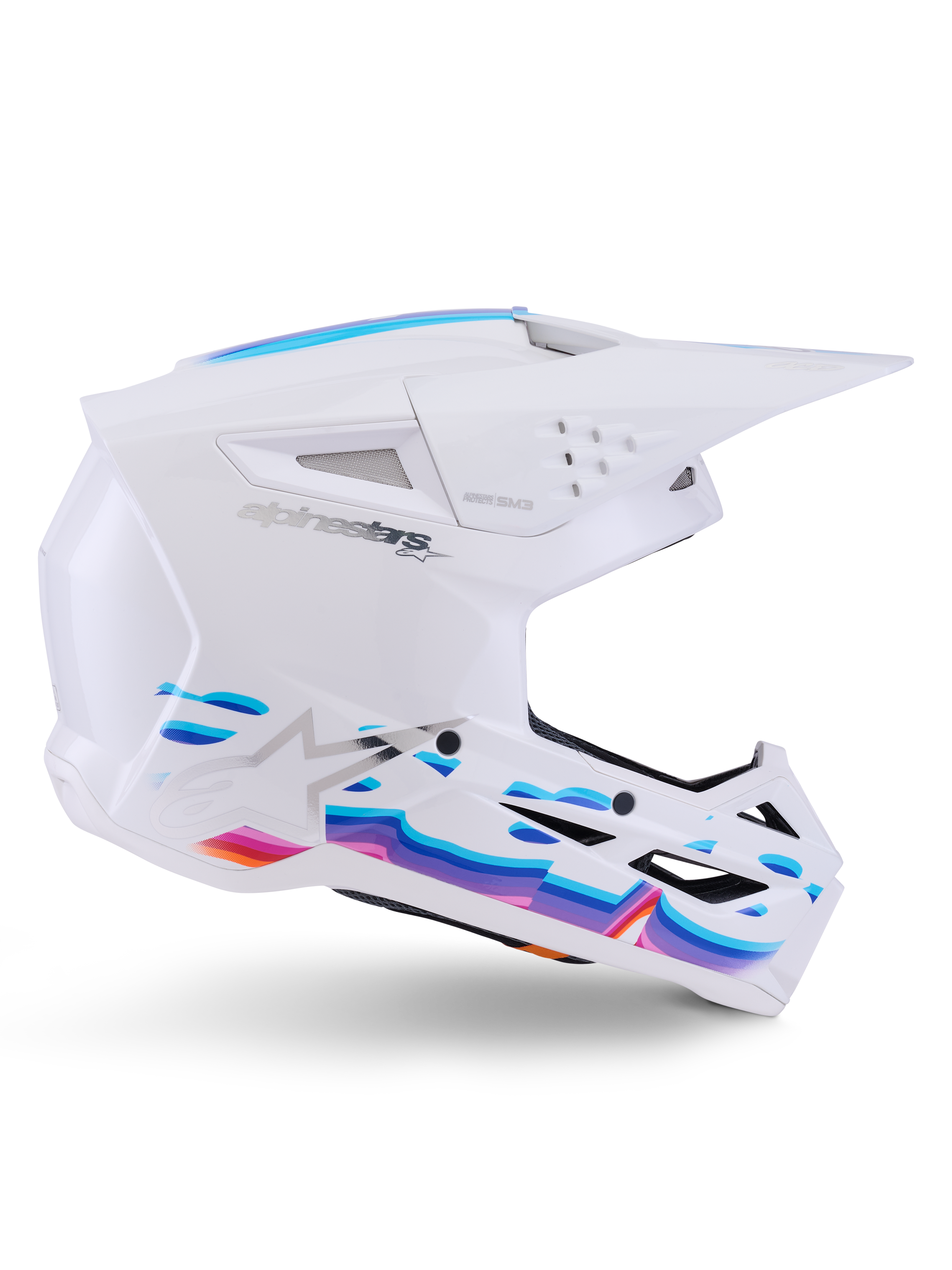 Capacete Alpinestars S-M3 Force OCD, Branco Brilhante, capacete de motocross com gráficos ondulados vibrantes em azul, roxo e laranja, perfil lateral com viseira aerodinâmica e múltiplas aberturas de ventilação