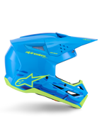 Capacete Alpinestars S-M3 Force OCD, capacete de motocross e off-road, ciano brilhante com detalhes em amarelo néon, certificação ECE 22.06, calota aerodinâmica com aberturas de ventilação, viseira pontiaguda e gráficos com o logótipo da estrela