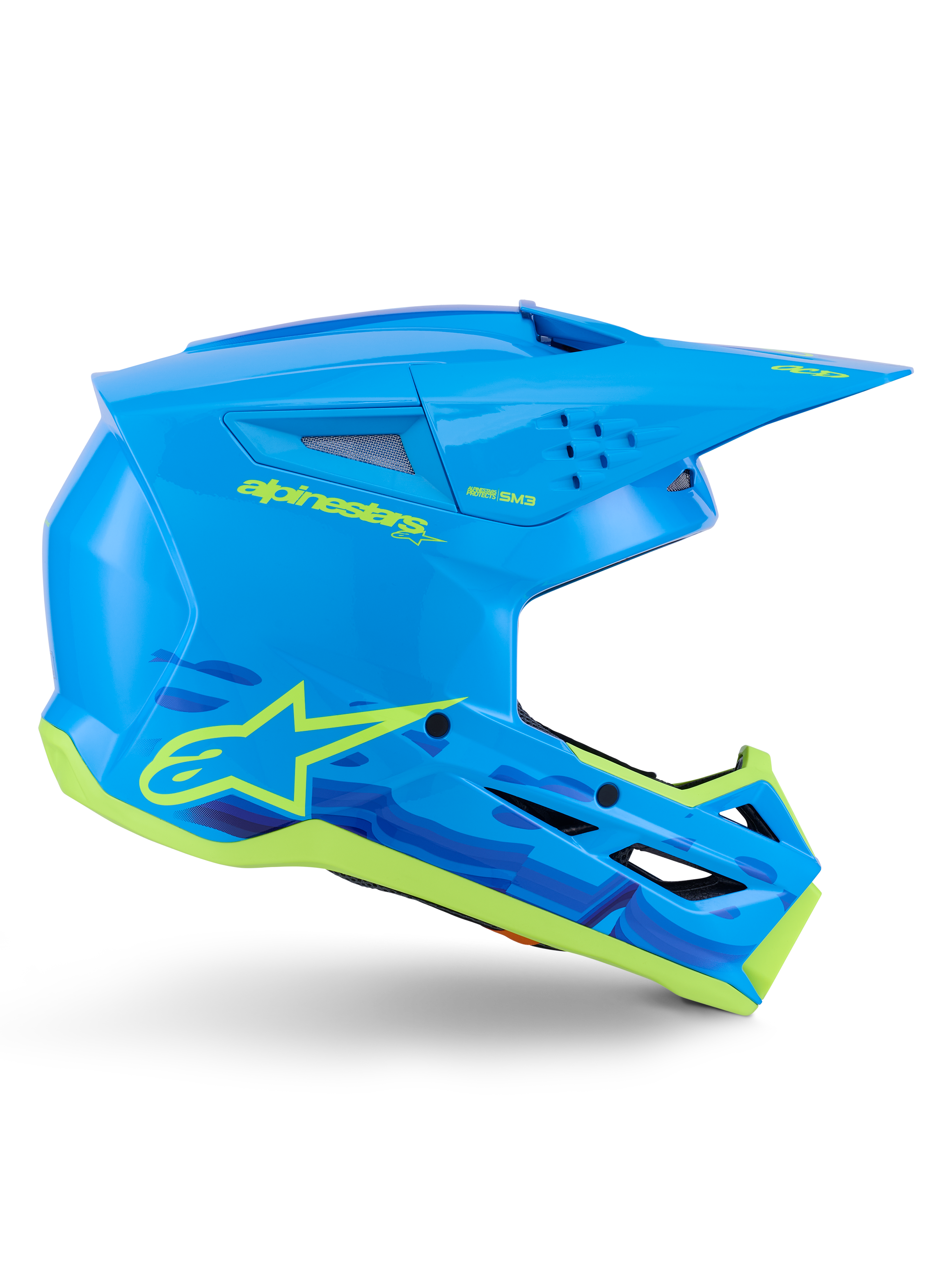 Capacete Alpinestars S-M3 Force OCD, capacete de motocross e off-road, ciano brilhante com detalhes em amarelo néon, certificação ECE 22.06, calota aerodinâmica com aberturas de ventilação, viseira pontiaguda e gráficos com o logótipo da estrela