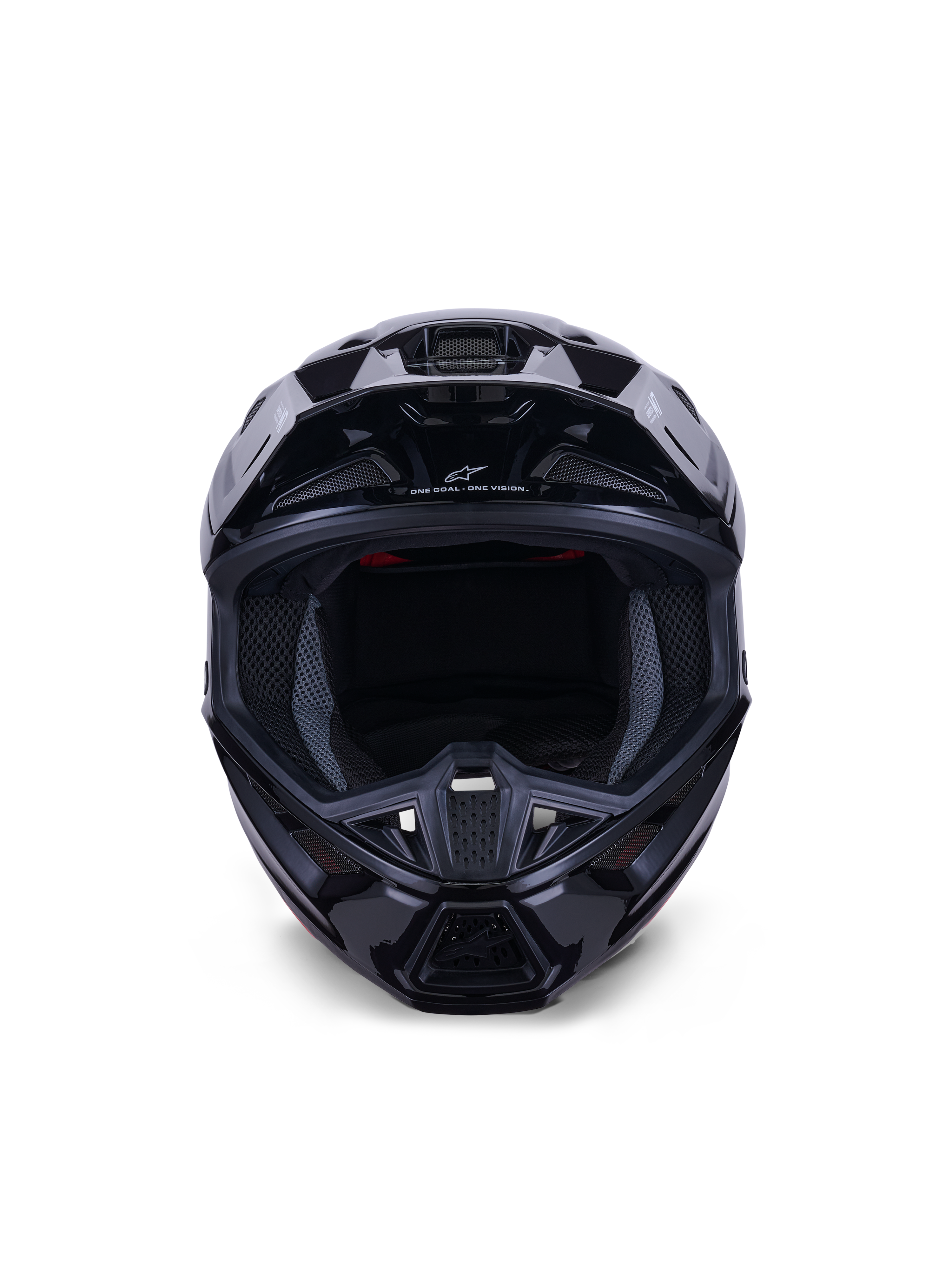 Capacete Alpinestars S-M7 Solid ECE 22.06, capacete de motocross, preto brilhante, vista frontal destacando a calota composta aerodinâmica, as aberturas de ventilação na proteção de queixo e o forro interno em malha, acabamento elegante para corridas off-road