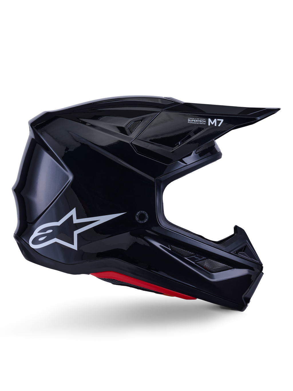 Alpinestars S-M7 Solid Helmet, capacete de motocross, preto brilhante com logótipo de estrela branco e detalhes vermelhos, perfil lateral com design aerodinâmico, entradas de ar em rede angulares e marca Supertech M7 na viseira
