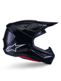 Alpinestars S-M7 Solid Helmet, capacete de motocross, preto brilhante com logótipo de estrela branco e detalhes vermelhos, perfil lateral com design aerodinâmico, entradas de ar em rede angulares e marca Supertech M7 na viseira