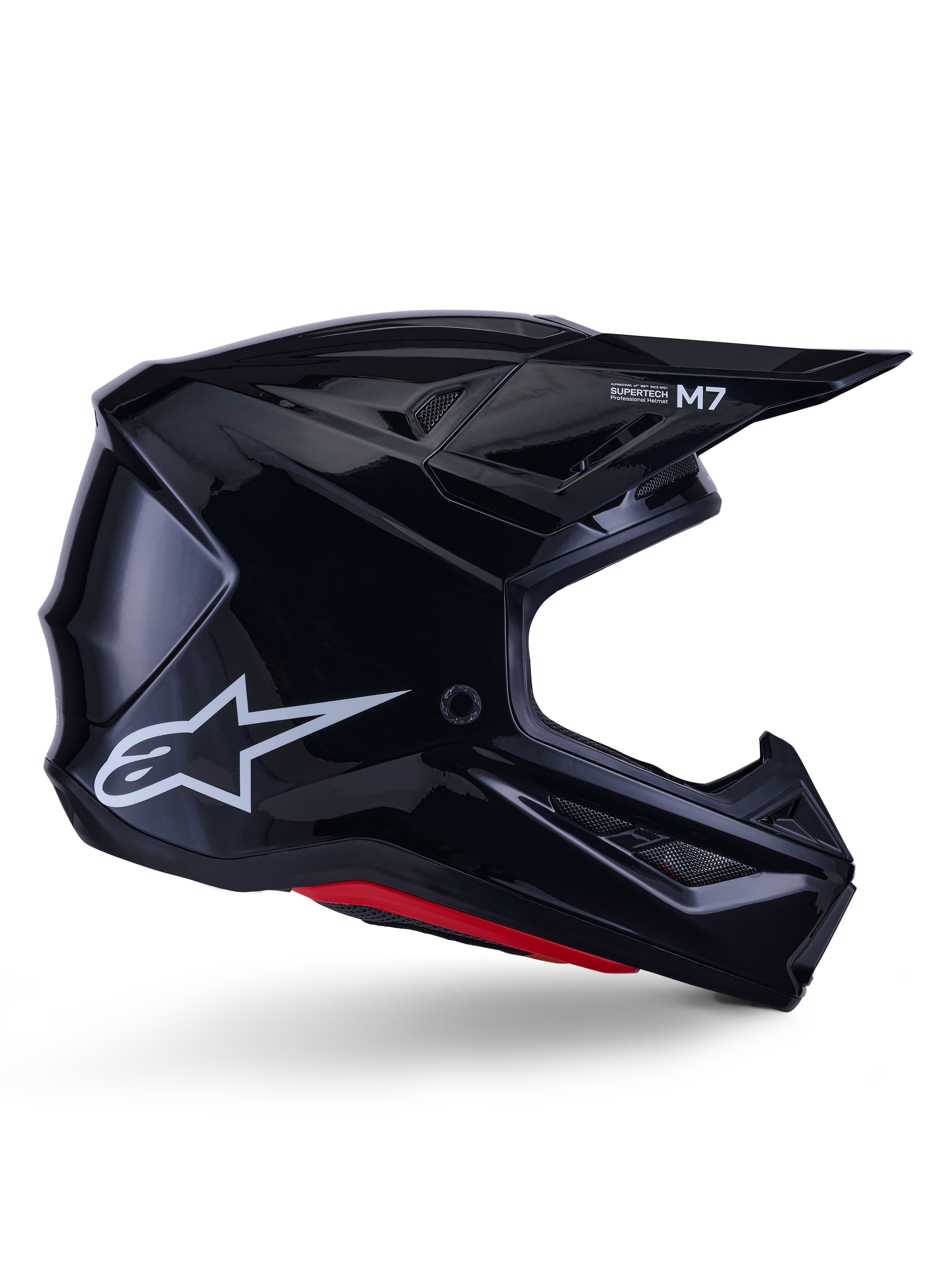Alpinestars S-M7 Solid Helmet, capacete de motocross, preto brilhante com logótipo de estrela branco e detalhes vermelhos, perfil lateral com design aerodinâmico, entradas de ar em rede angulares e marca Supertech M7 na viseira