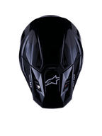 Alpinestars S-M7 Solid Helmet ECE 22.06, capacete de motocross, preto brilhante, vista superior mostrando a calota composta aerodinâmica com logótipo Astars e marca M7, design elegante com aberturas de ventilação para performance em corridas todo-o-terreno