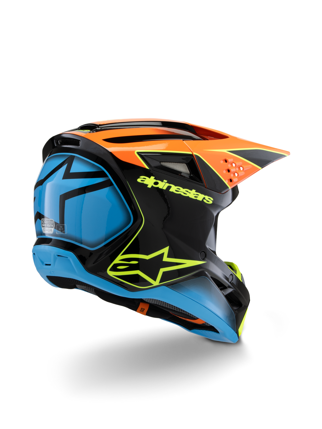 Capacete Alpinestars S-M3 Youth Fray, capacete de motocross, preto, cor-de-laranja e azul com pormenores em amarelo néon, vista traseira de três quartos realçando a marca Alpinestars e o logótipo da estrela, design aerodinâmico para competições off-road juvenis