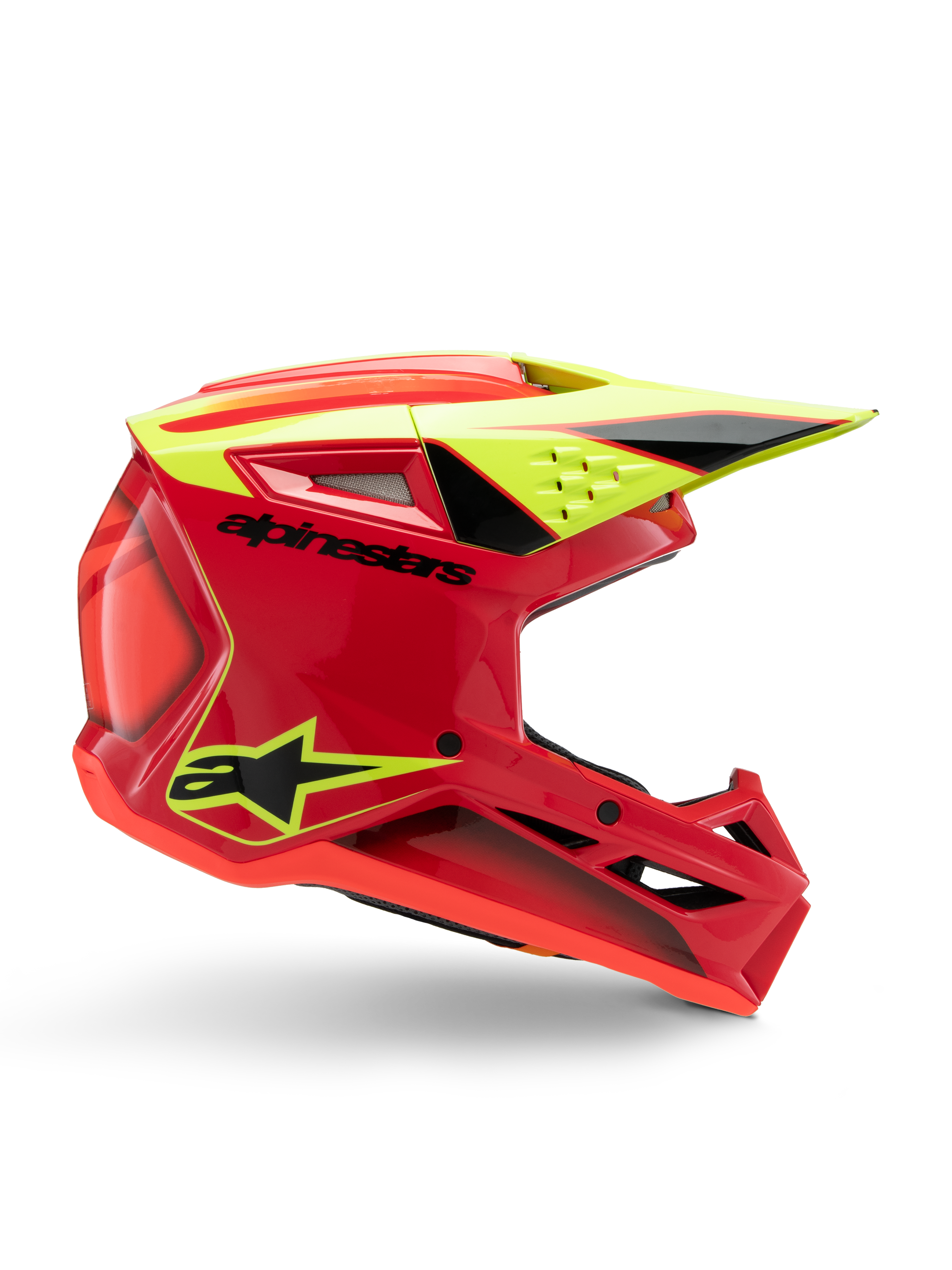 Capacete Alpinestars S-M3 Youth Fray, capacete de motocross, vermelho, amarelo néon e preto brilhante, vista de perfil lateral exibindo um design aerodinâmico elegante com viseira integrada e aberturas de ventilação proeminentes, logótipo preto sobre uma calota vermelha vibrante, otimizado para desempenho off-road de jovens pilotos