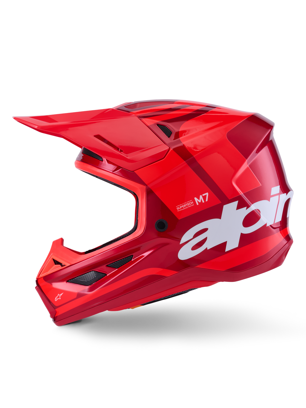 Alpinestars S-M7 Core Helmet, Red Glossy with geometric accents, Motocross Helmet, side profile view, aerodynamic shell with ventilation ports and white branding, high-performance off-road racing gear