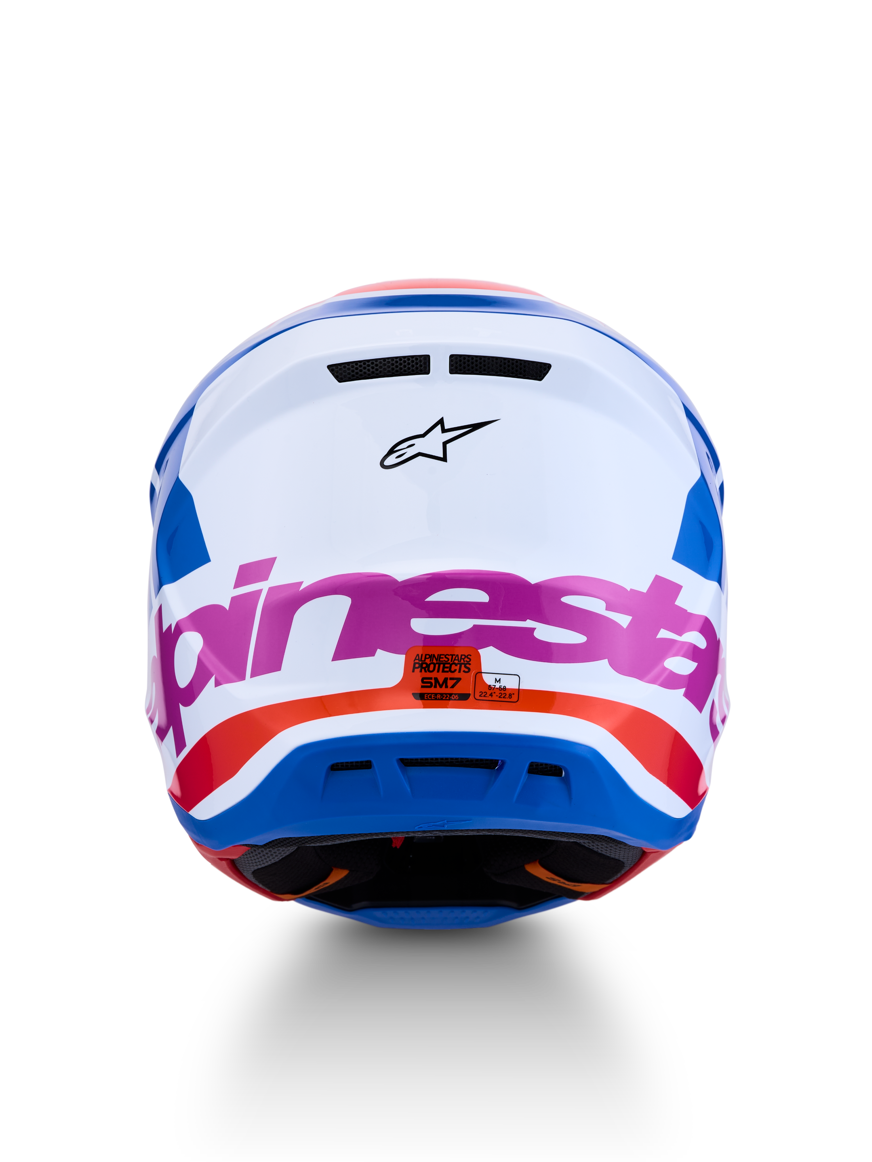 Alpinestars S-M7 Core ECE06, capacete motocross branco e azul com rosa e laranja, vista traseira, certificado ECE 22.06.