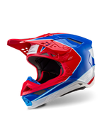 Capacete Alpinestars Supertech M10 Aeon, capacete de motocross, vermelho e azul brilhante, vista em três quartos mostrando a calota aerodinâmica com múltiplas aberturas de ventilação, pormenores gráficos em branco e vermelho, logótipo Alpinestars na viseira e na lateral, equipamento de corrida profissional todo-o-terreno