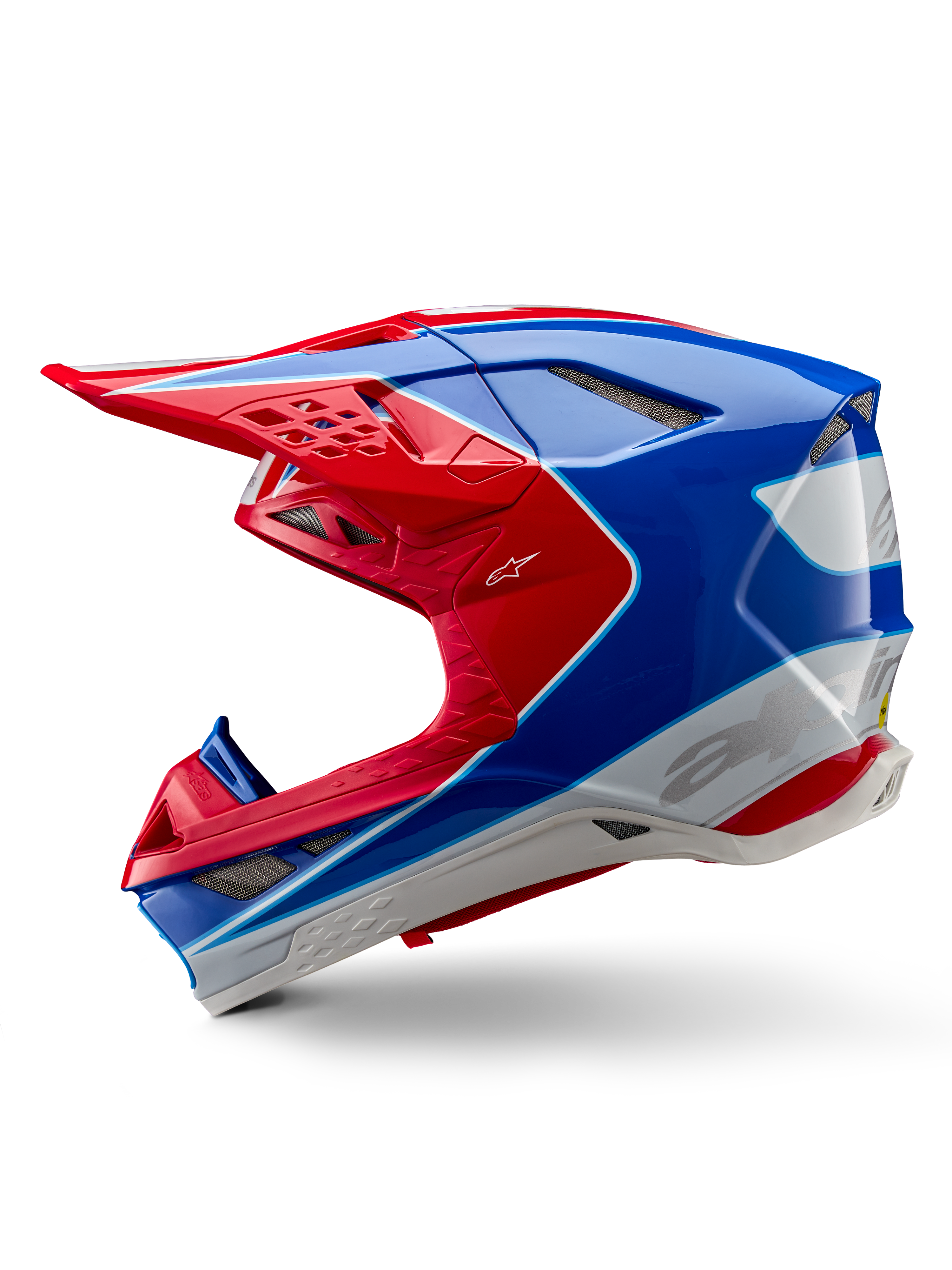 Capacete Alpinestars Supertech M10 Aeon ECE 22.06, capacete de motocross, vermelho e azul brilhante, vista de perfil, calota multi-compósita aerodinâmica com aberturas de ventilação integradas e design gráfico em vermelho e azul, acabamento brilhante para competições off-road