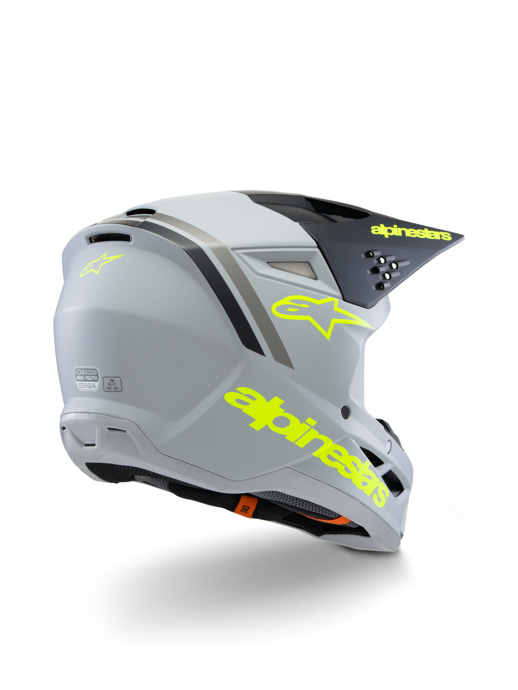 Alpinestars S-M3 Youth Radium Helmet ECE 22.06, capacete de motocross, cinzento, preto e amarelo fluorescente mate, vista traseira de três quartos mostrando a marca amarela e o logótipo de estrela, calota aerodinâmica com ventilação para condução todo-o-terreno