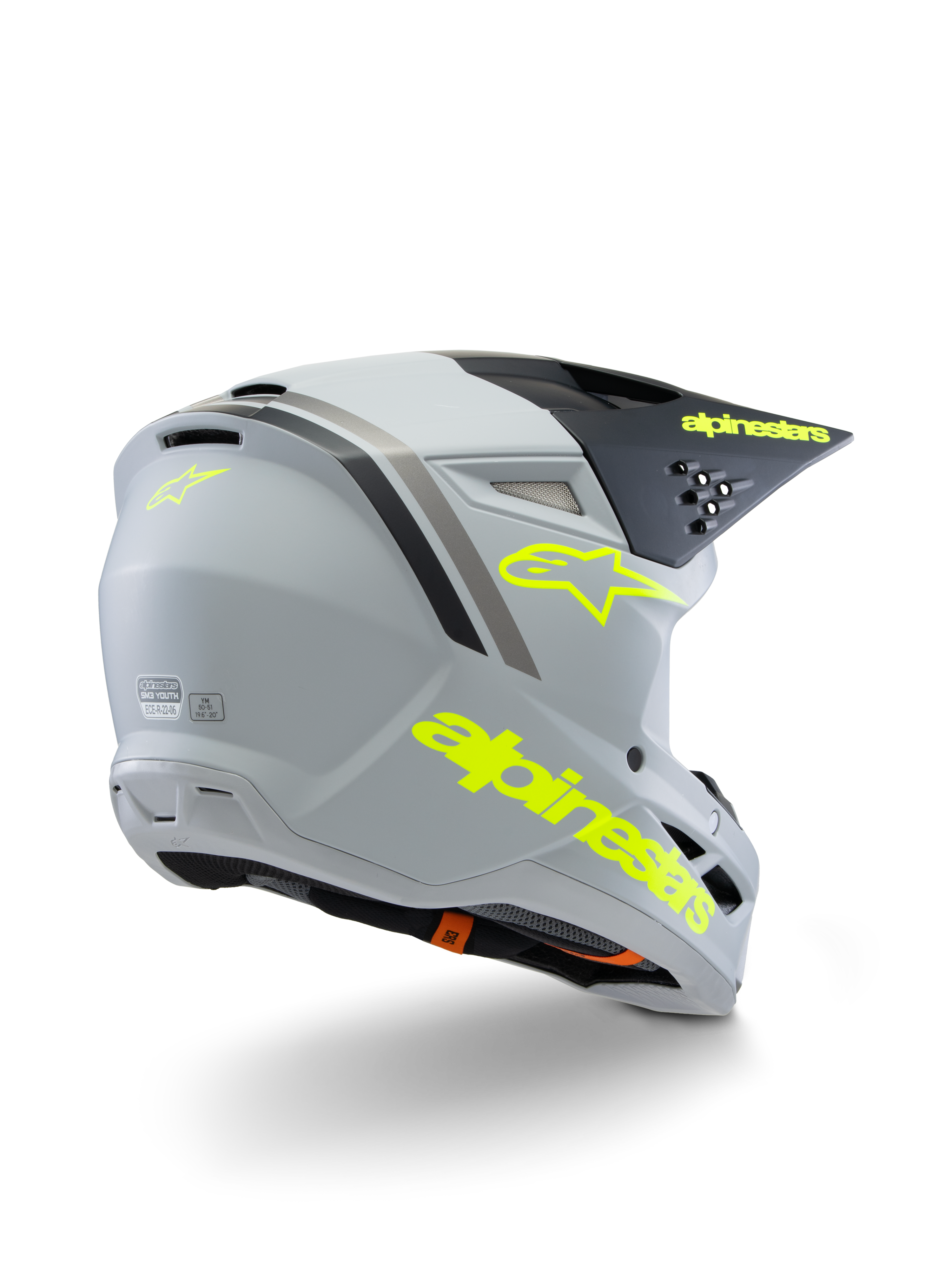 Alpinestars S-M3 Youth Radium Helmet ECE 22.06, capacete de motocross, cinzento, preto e amarelo fluorescente mate, vista traseira de três quartos mostrando a marca amarela e o logótipo de estrela, calota aerodinâmica com ventilação para condução todo-o-terreno