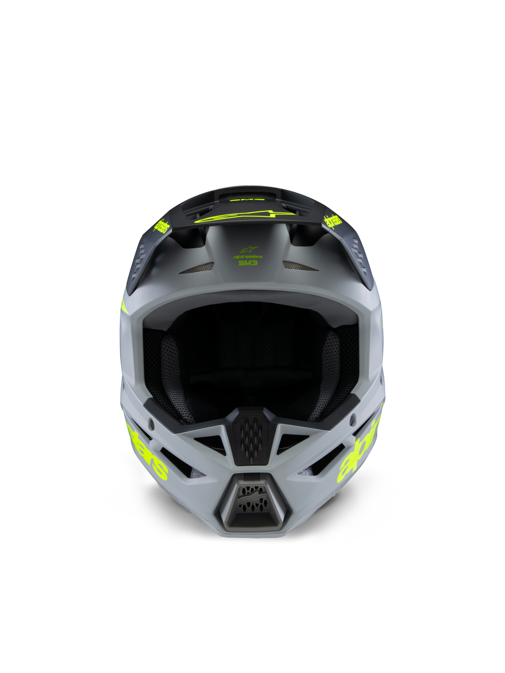 Capacete Alpinestars S-M3 Youth Radium, capacete de motocross, cinzento, preto e amarelo fluo mate, vista frontal com uma calota angular agressiva, logótipos amarelos vibrantes nas laterais e na pala, acabamento mate concebido para motocross e corridas off-road para jovens