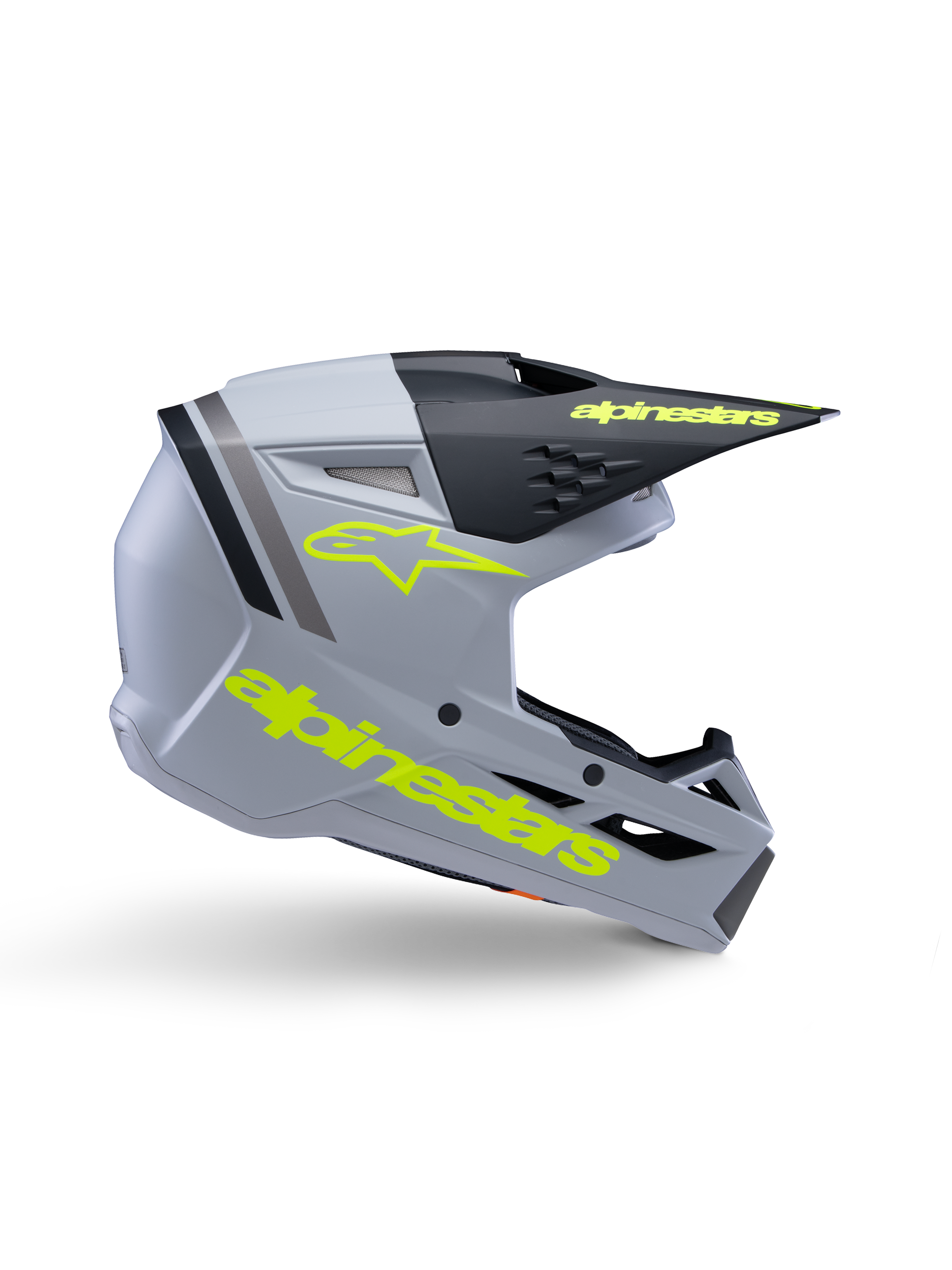 Capacete Alpinestars S-M3 Youth Radium ECE 22.06, capacete de motocross para jovens, cinzento mate e preto com logótipos em amarelo néon, perfil lateral exibindo o logótipo e texto Alpinestars, design aerodinâmico com ventilação integrada e viseira preta.