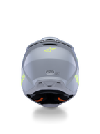 Capacete Alpinestars S-M3 Youth Radium ECE 22.06, Cinzento, Preto e Amarelo Fluo Mate, vista traseira mostrando as aberturas de ventilação e etiquetas de certificação, logótipo de estrela em amarelo fluorescente, design de calota aerodinâmico para motocross e corridas off-road