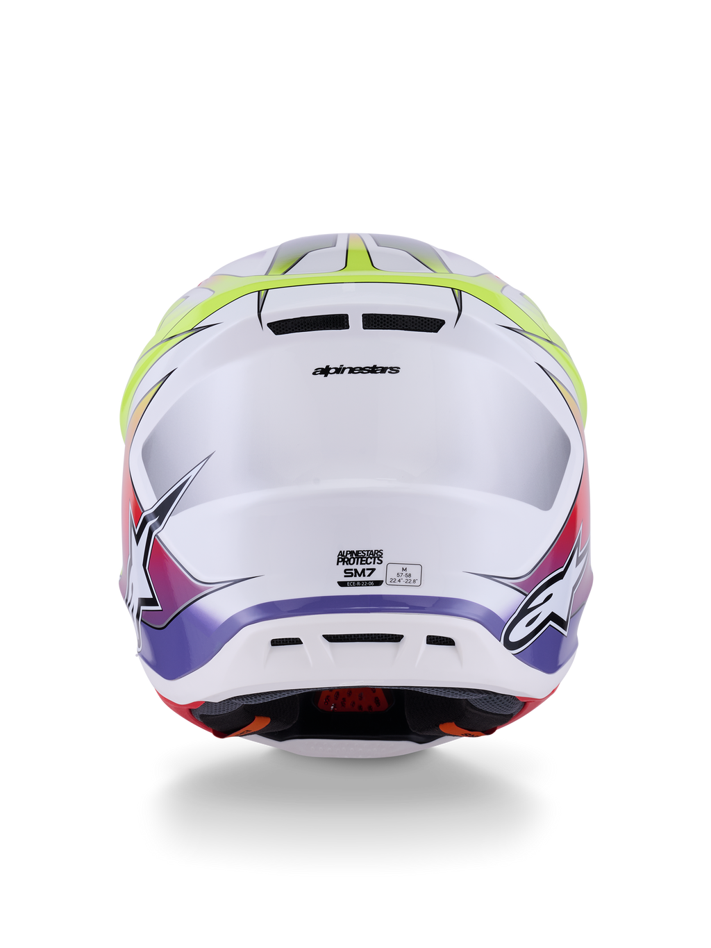 Capacete Alpinestars S-M7 Fuse ECE 22.06, capacete de motocross, branco, amarelo néon e roxo brilhante, vista traseira com saídas de ar integradas, marca Alpinestars e logótipos laterais, design aerodinâmico e elegante da calota.