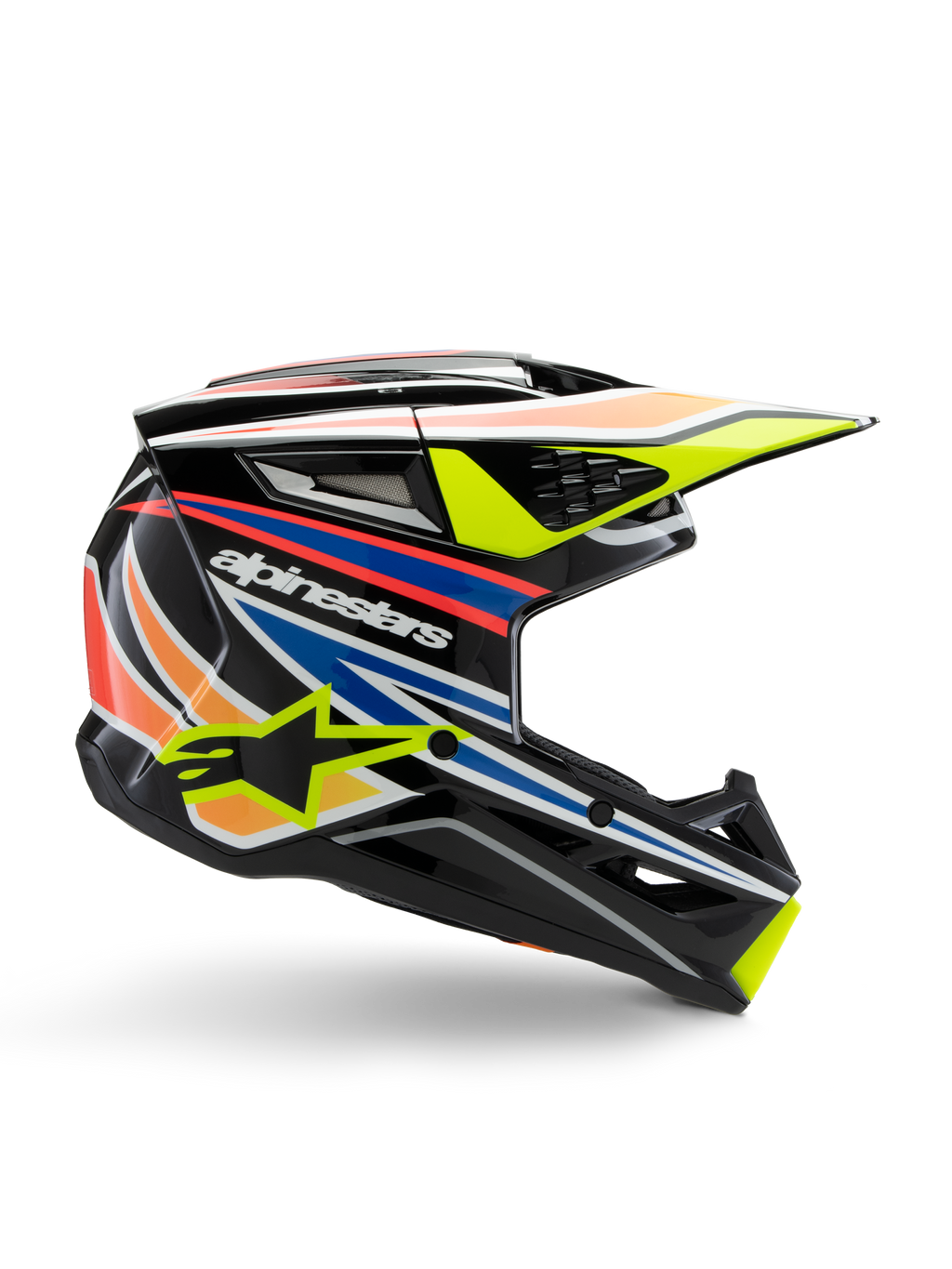 Alpinestars S-M3 Youth Wurx Helmet, capacete de motocross para jovens, preto com riscas gráficas amarelas, azuis, vermelhas e cor de laranja, perfil lateral com viseira aerodinâmica e acabamento brilhante, com logótipo Alpinestars branco e grafismo de estrela amarela