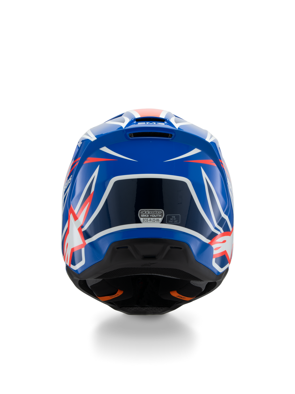 Alpinestars S-M3 Youth Wurx Helmet ECE 22.06, capacete de motocross, azul, vermelho e branco, vista traseira realçando o design aerodinâmico com saídas de ar, acabamento brilhante com detalhes gráficos nítidos e autocolante de certificação de segurança
