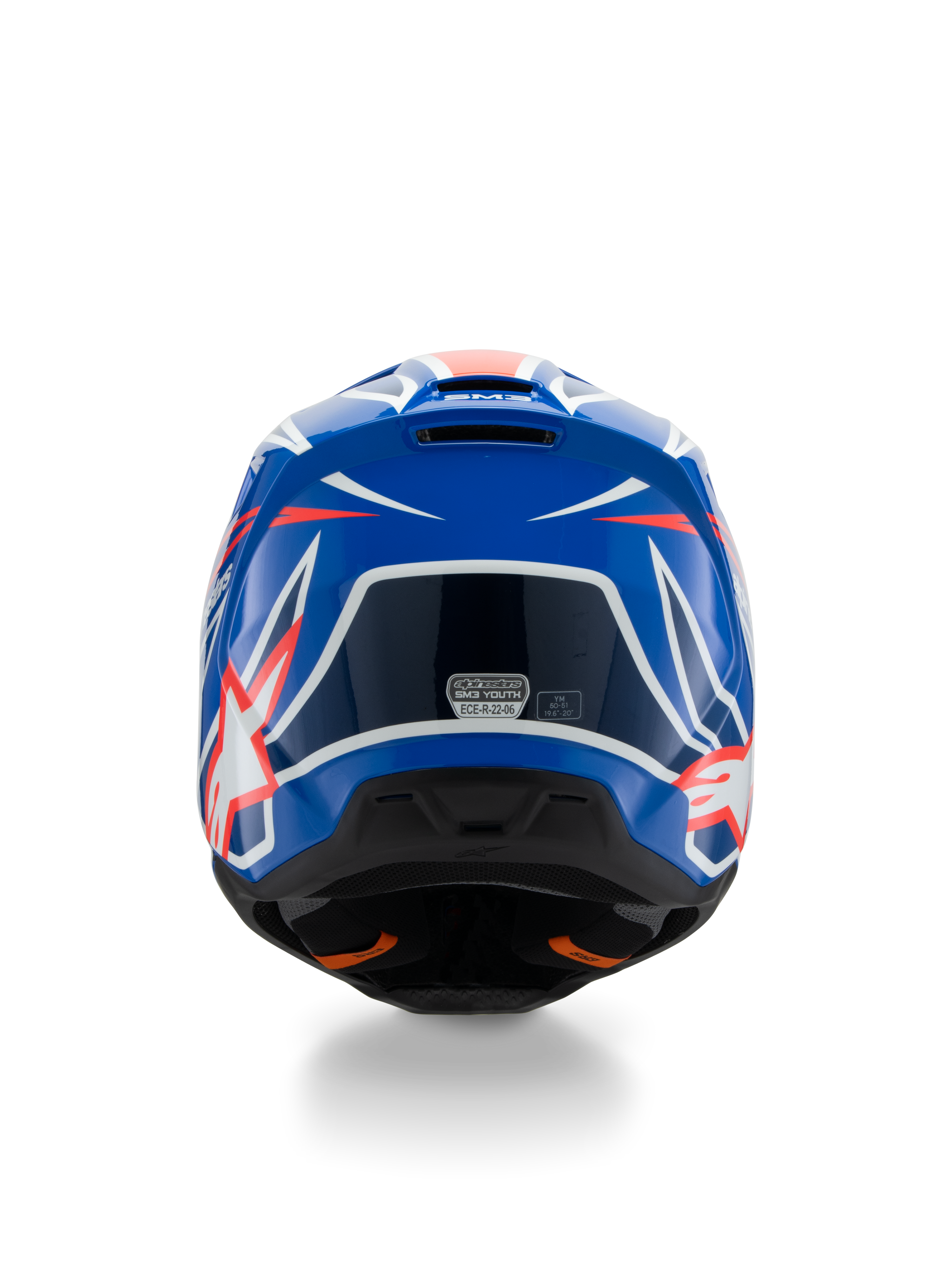 Alpinestars S-M3 Youth Wurx Helmet ECE 22.06, capacete de motocross, azul, vermelho e branco, vista traseira realçando o design aerodinâmico com saídas de ar, acabamento brilhante com detalhes gráficos nítidos e autocolante de certificação de segurança