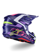 Capacete Alpinestars S-M7 Deed, capacete de motocross, roxo e rosa brilhante, vista lateral traseira com detalhes em branco e verde-lima, logótipo Alpinestars e estrela em rosa vibrante, design de calota composta aerodinâmica para performance off-road