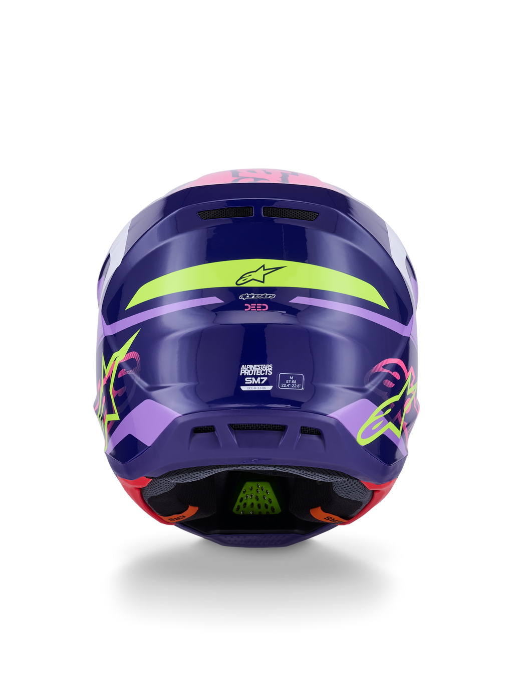 Alpinestars S-M7 Deed Helmet ECE 22.06, capacete de motocross, vista traseira em roxo e rosa brilhante, com gráficos em amarelo néon e rosa, calota composta aerodinâmica com a marca SM7 e marcações de certificação, equipamento de corrida off-road de alto desempenho