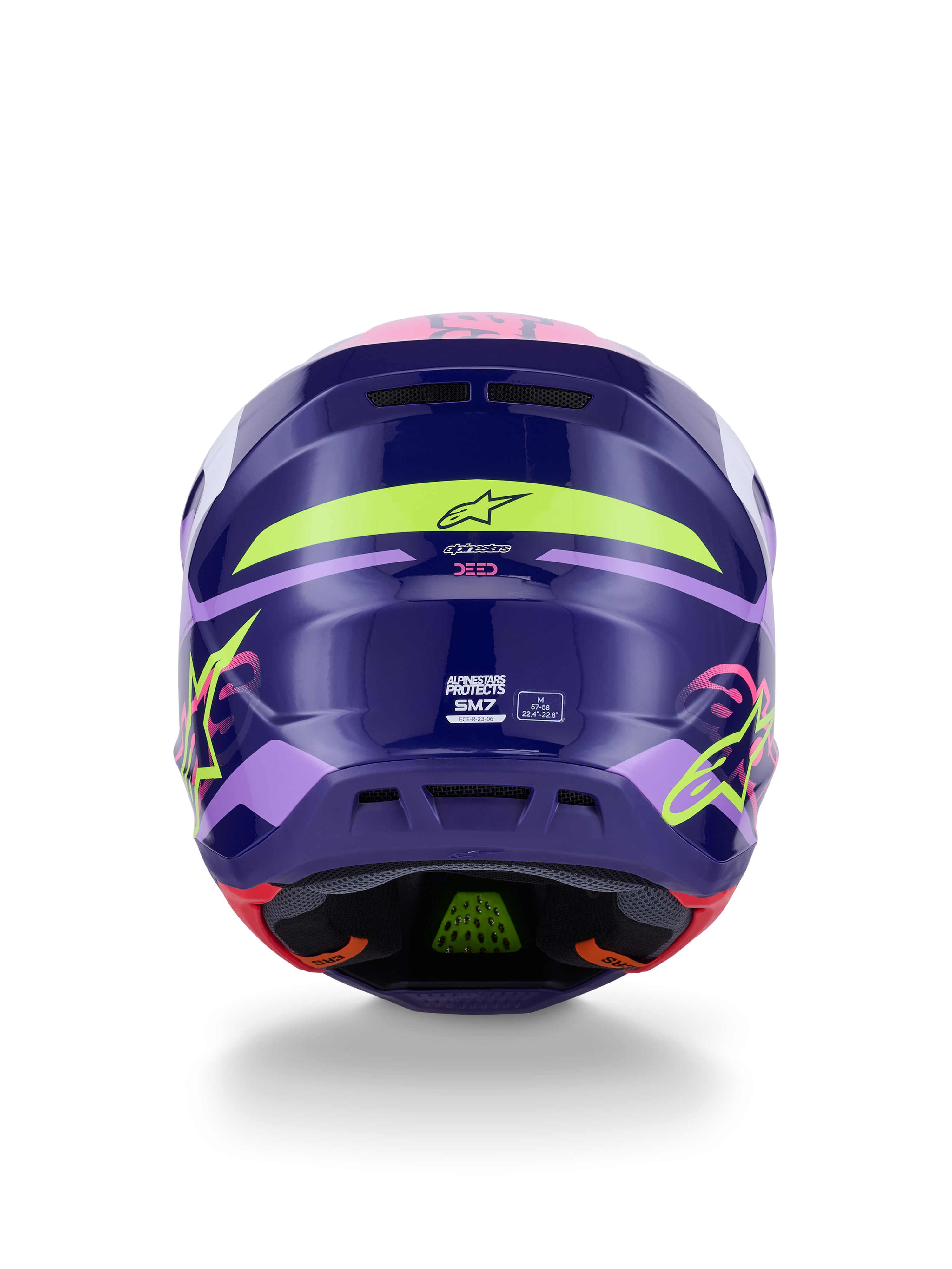 Alpinestars S-M7 Deed Helmet ECE 22.06, capacete de motocross, vista traseira em roxo e rosa brilhante, com gráficos em amarelo néon e rosa, calota composta aerodinâmica com a marca SM7 e marcações de certificação, equipamento de corrida off-road de alto desempenho