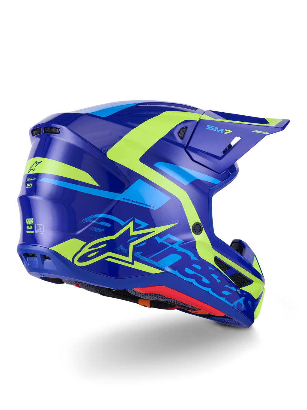 Capacete Alpinestars S-M7 Deed ECE 22.06, capacete de motocross, azul e amarelo fluo brilhante, vista lateral traseira com perfil de calota aerodinâmico, branding Alpinestars destacado com detalhes em amarelo néon, aberturas de ventilação de alta performance e acabamento brilhante para corridas todo-o-terreno