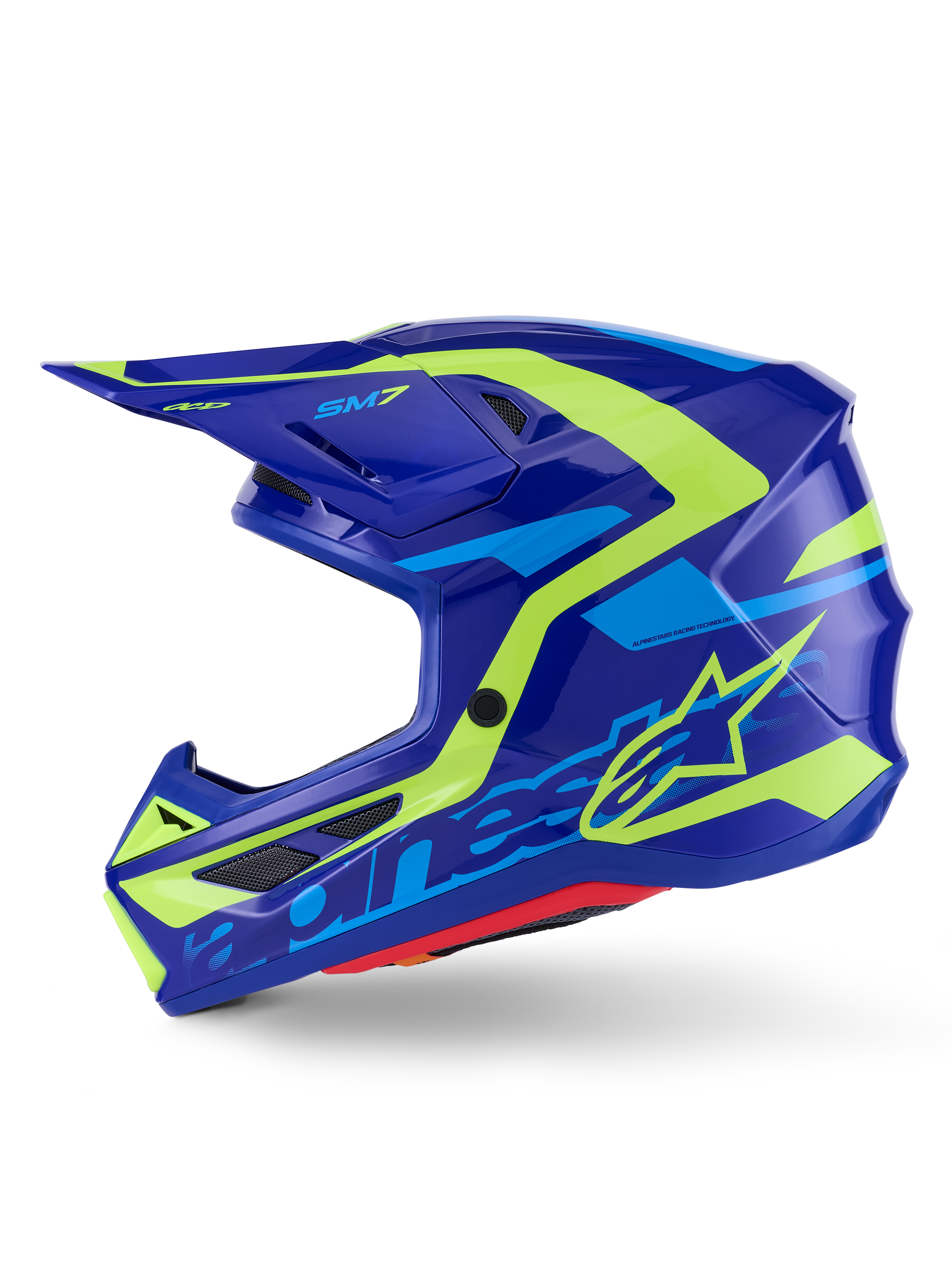 Capacete Alpinestars S-M7 Deed, capacete de motocross, azul e amarelo néon brilhante, vista lateral, calota composta aerodinâmica com grafismos vibrantes em amarelo e azul claro, com aberturas de ventilação protegidas por malha e viseira para desempenho off-road