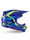 Capacete Alpinestars S-M7 Deed ECE 22.06, capacete de motocross, azul e amarelo néon brilhante, vista de perfil lateral com calota aerodinâmica e logótipo Alpinestars em destaque, detalhes gráficos em amarelo vibrante e azul claro, múltiplas aberturas de ventilação e design de viseira integrada para corridas off-road de elite