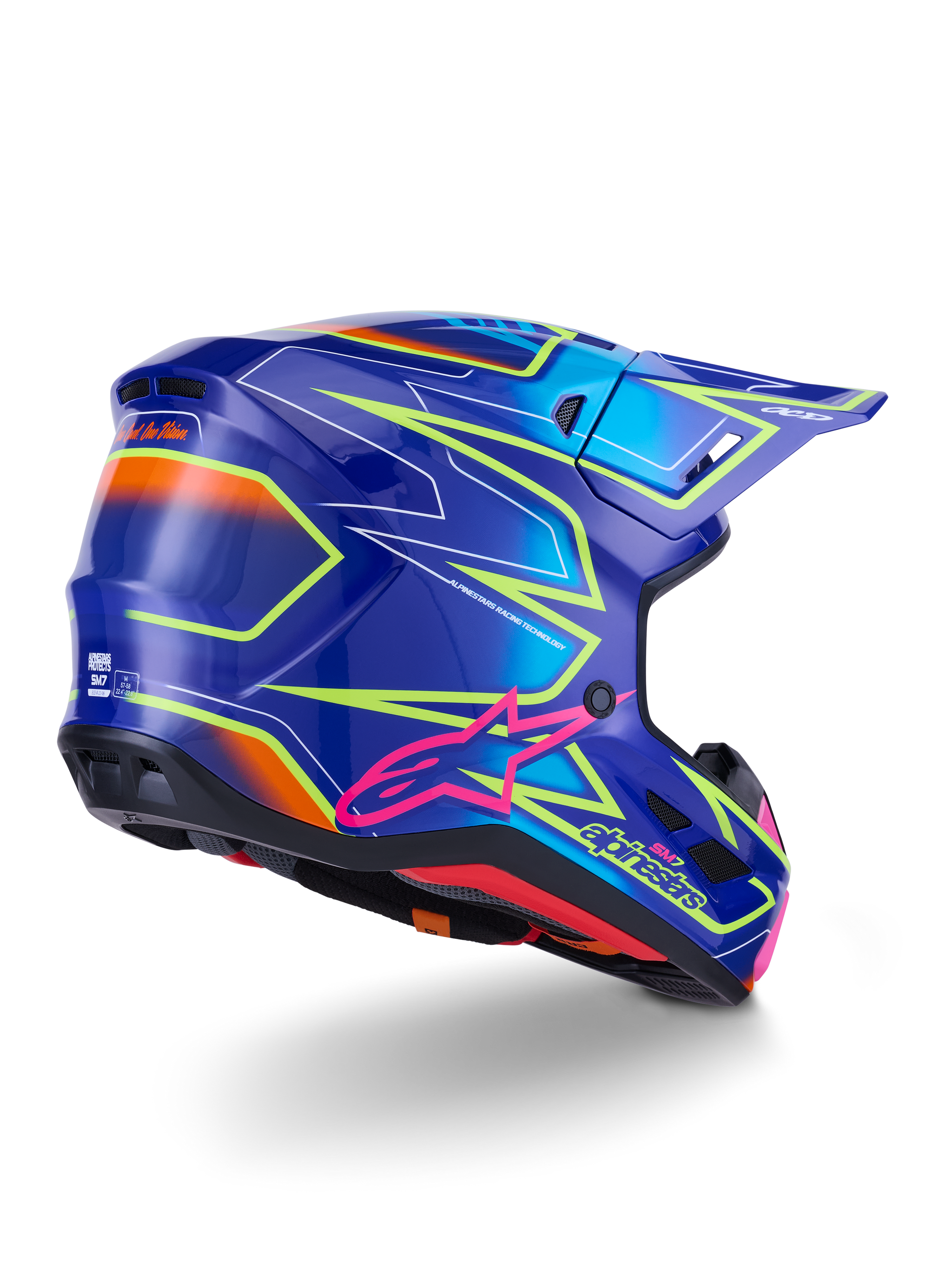 Capacete Alpinestars S-M7 Cast, capacete de motocross, azul, cor-de-rosa e amarelo néon brilhante, vista de três quartos traseira exibindo o casco aerodinâmico com gráficos angulares marcantes, logótipo Astar cor-de-rosa e aberturas de ventilação integradas para corridas off-road