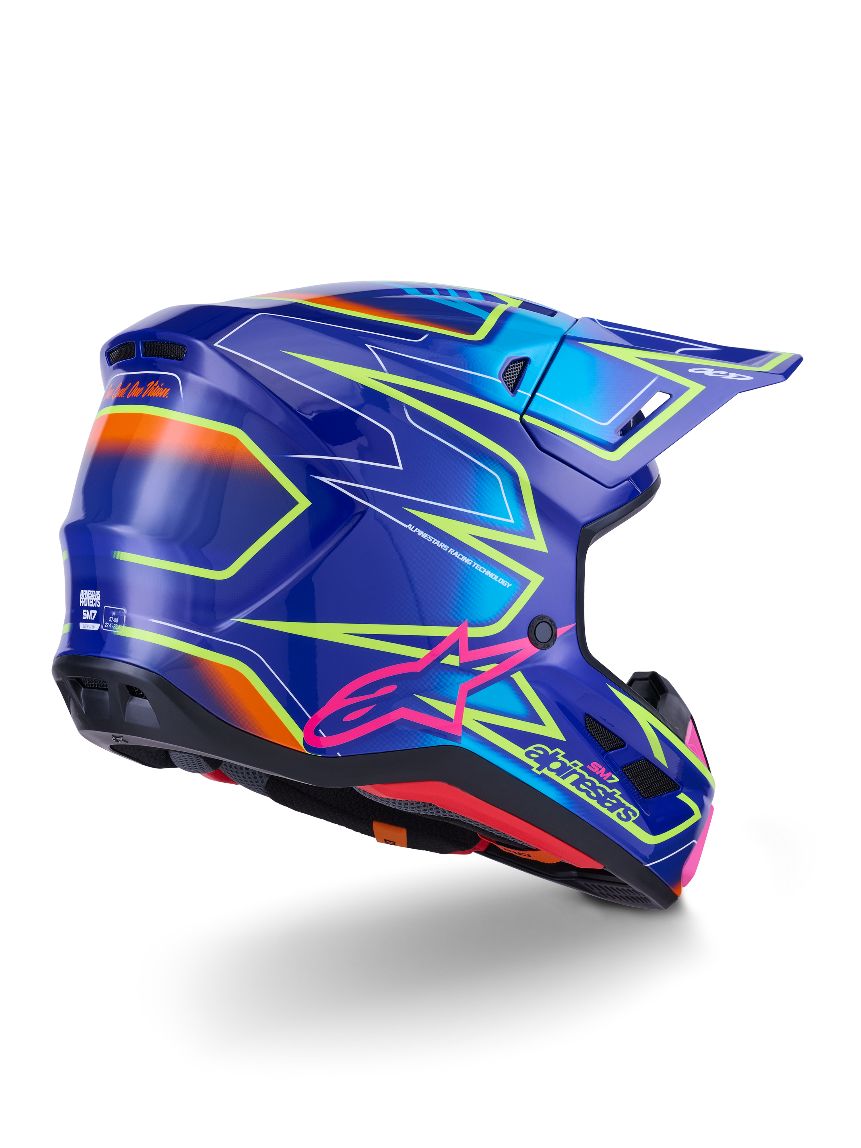 Capacete Alpinestars S-M7 Cast, capacete de motocross, azul, cor-de-rosa e amarelo néon brilhante, vista de três quartos traseira exibindo o casco aerodinâmico com gráficos angulares marcantes, logótipo Astar cor-de-rosa e aberturas de ventilação integradas para corridas off-road