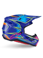 Capacete Alpinestars S-M7 Cast, capacete de motocross, azul, rosa e amarelo néon brilhante, vista lateral de perfil com padrões geométricos arrojados, logótipo Alpinestars cor-de-rosa e calota aerodinâmica ventilada