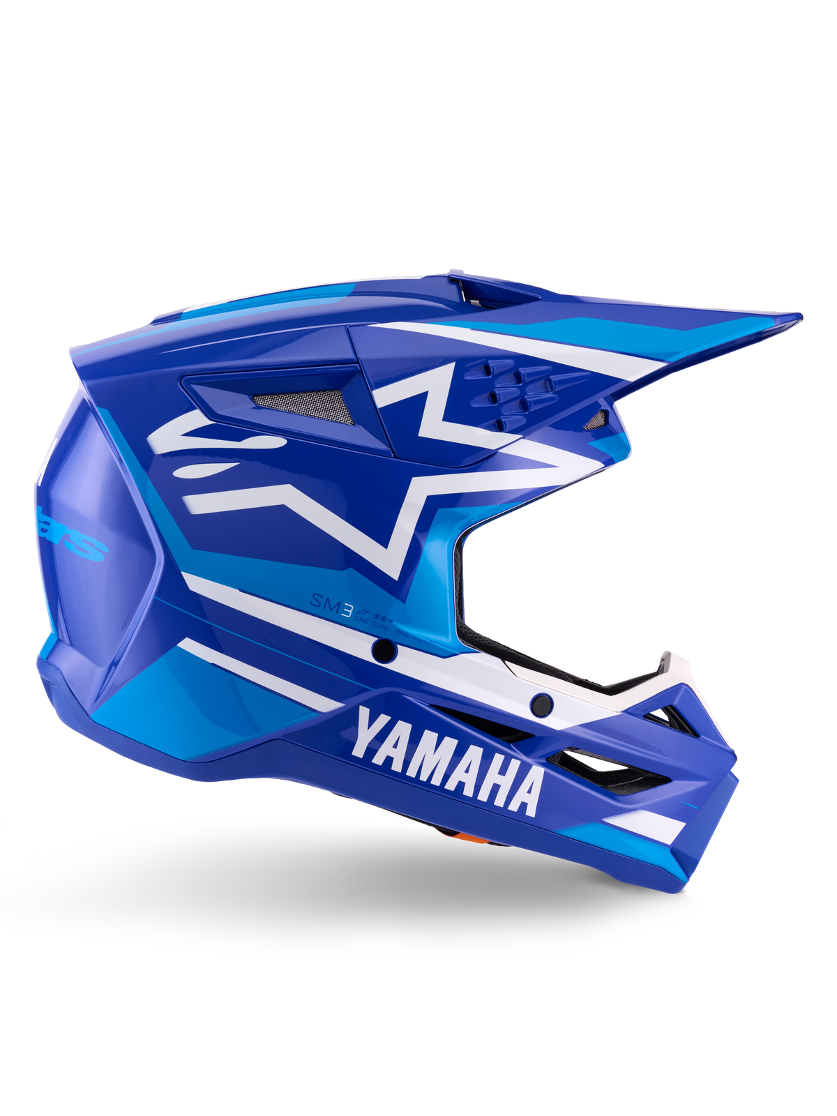 Capacete Alpinestars Yamaha S-M3 ECE 22.06, capacete de motocross, azul e branco brilhante, com marca Yamaha em destaque e padrões geométricos, design aerodinâmico com aberturas de ventilação em rede preta e viseira pontiaguda, equipamento profissional de todo-o-terreno