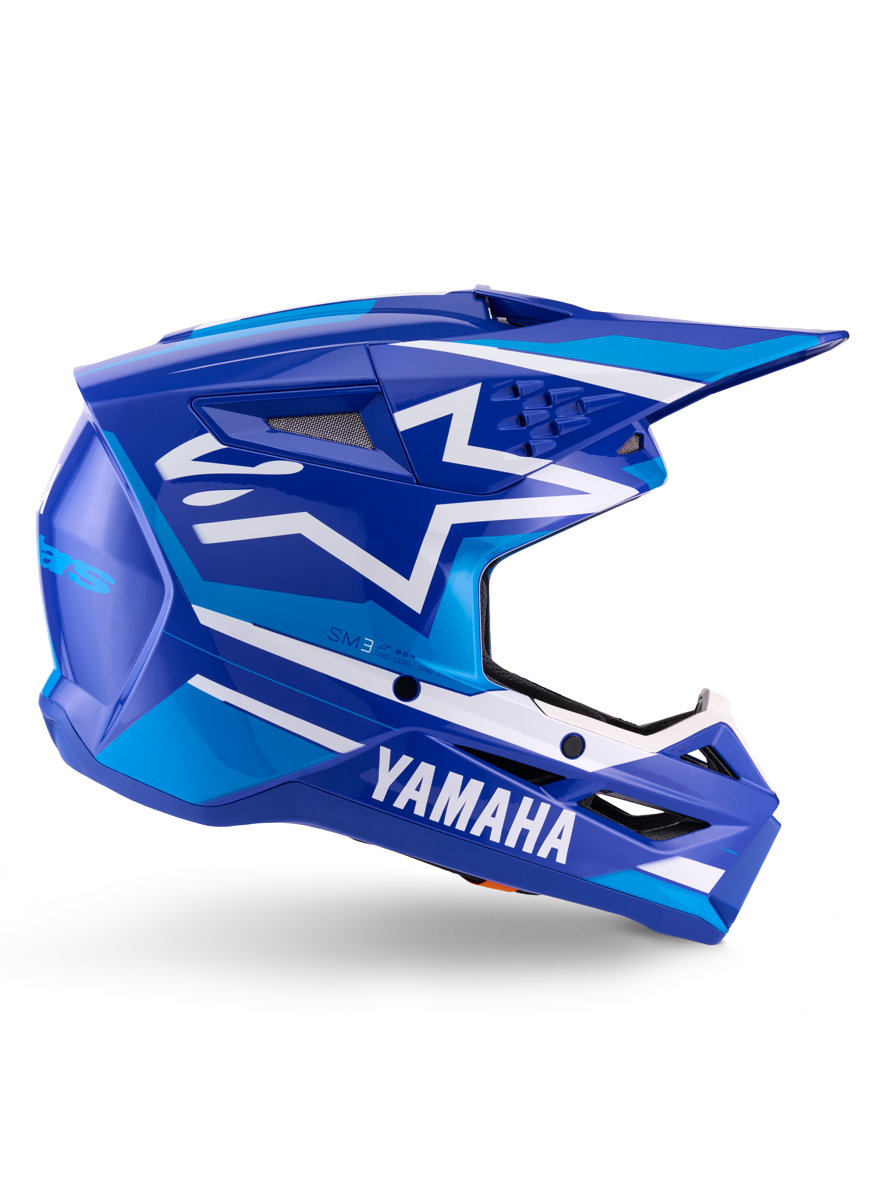 Capacete Alpinestars Yamaha S-M3 ECE 22.06, capacete de motocross, azul e branco brilhante, com marca Yamaha em destaque e padrões geométricos, design aerodinâmico com aberturas de ventilação em rede preta e viseira pontiaguda, equipamento profissional de todo-o-terreno