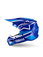 Capacete de Motocross Yamaha S-M3 para Jovens, capacete de motocross, azul e branco brilhante, vista de perfil lateral, com a marca Yamaha em destaque na proteção de queixo e o logótipo da estrela da Alpinestars, calota aerodinâmica elegante com múltiplas entradas de ventilação e viseira integrada.