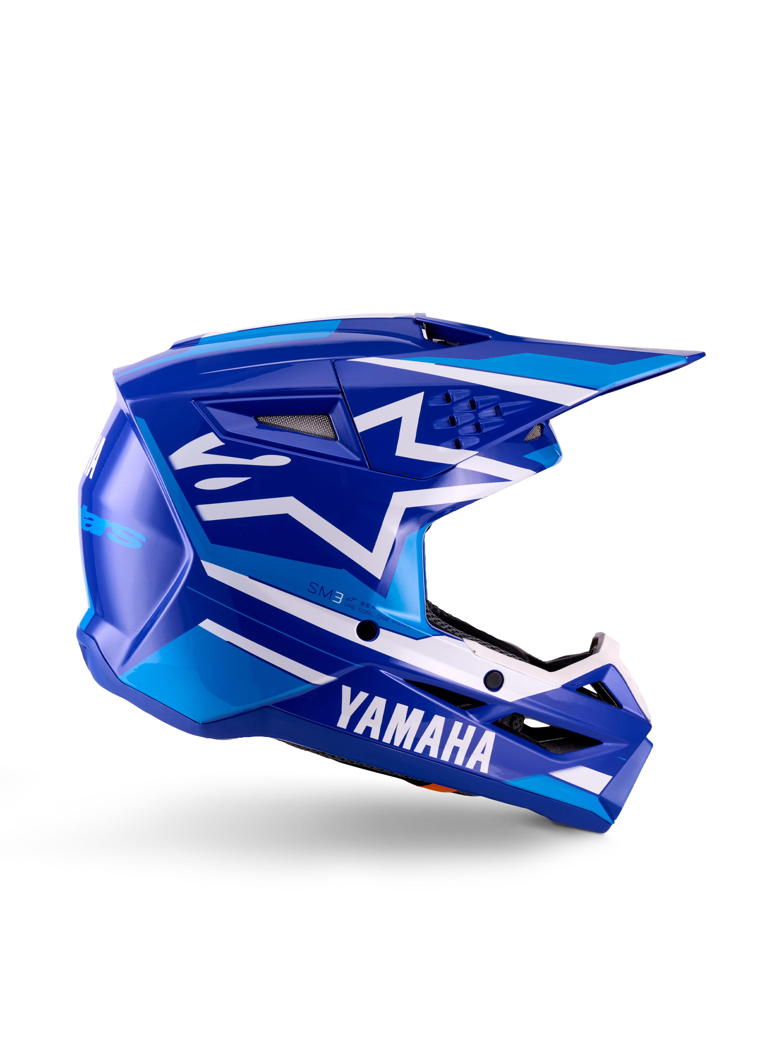 Capacete de Motocross para Jovens Yamaha S-M3, azul e branco brilhante, vista de perfil lateral com marca Yamaha em destaque e logótipo de estrela da Alpinestars, design geométrico com realces em azul claro, calota ventilada com viseira longa, proteção de cabeça para todo-o-terreno com certificação ECE 22.06