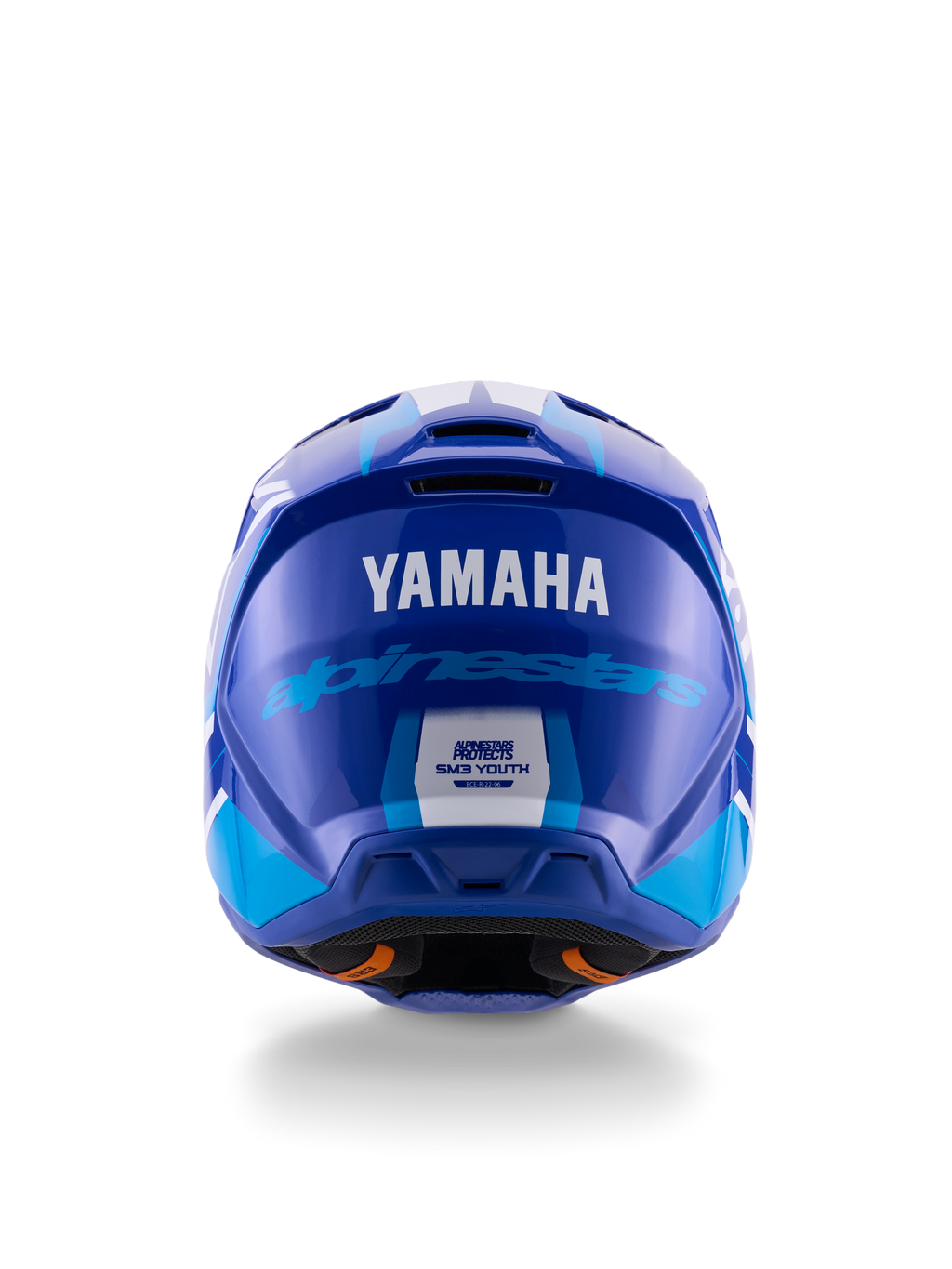 Capacete de Motocross Yamaha S-M3 para Jovens, vista traseira, azul e branco brilhante, com logótipos Yamaha e Alpinestars em destaque, design aerodinâmico com etiqueta de certificação de segurança ECE 22.06, proteção de cabeça profissional para todo-o-terreno