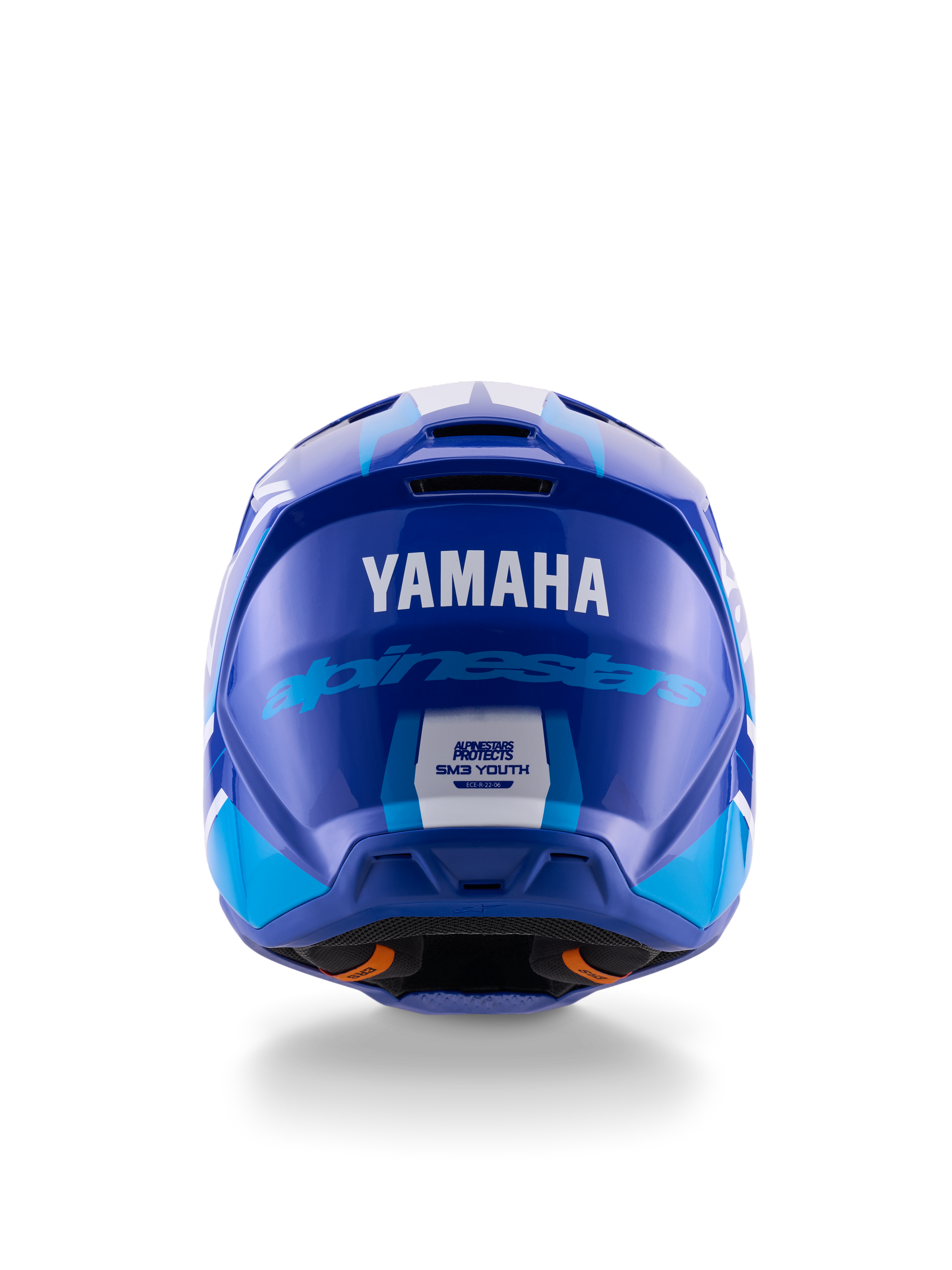 Capacete de Motocross Yamaha S-M3 para Jovens, vista traseira, azul e branco brilhante, com logótipos Yamaha e Alpinestars em destaque, design aerodinâmico com etiqueta de certificação de segurança ECE 22.06, proteção de cabeça profissional para todo-o-terreno