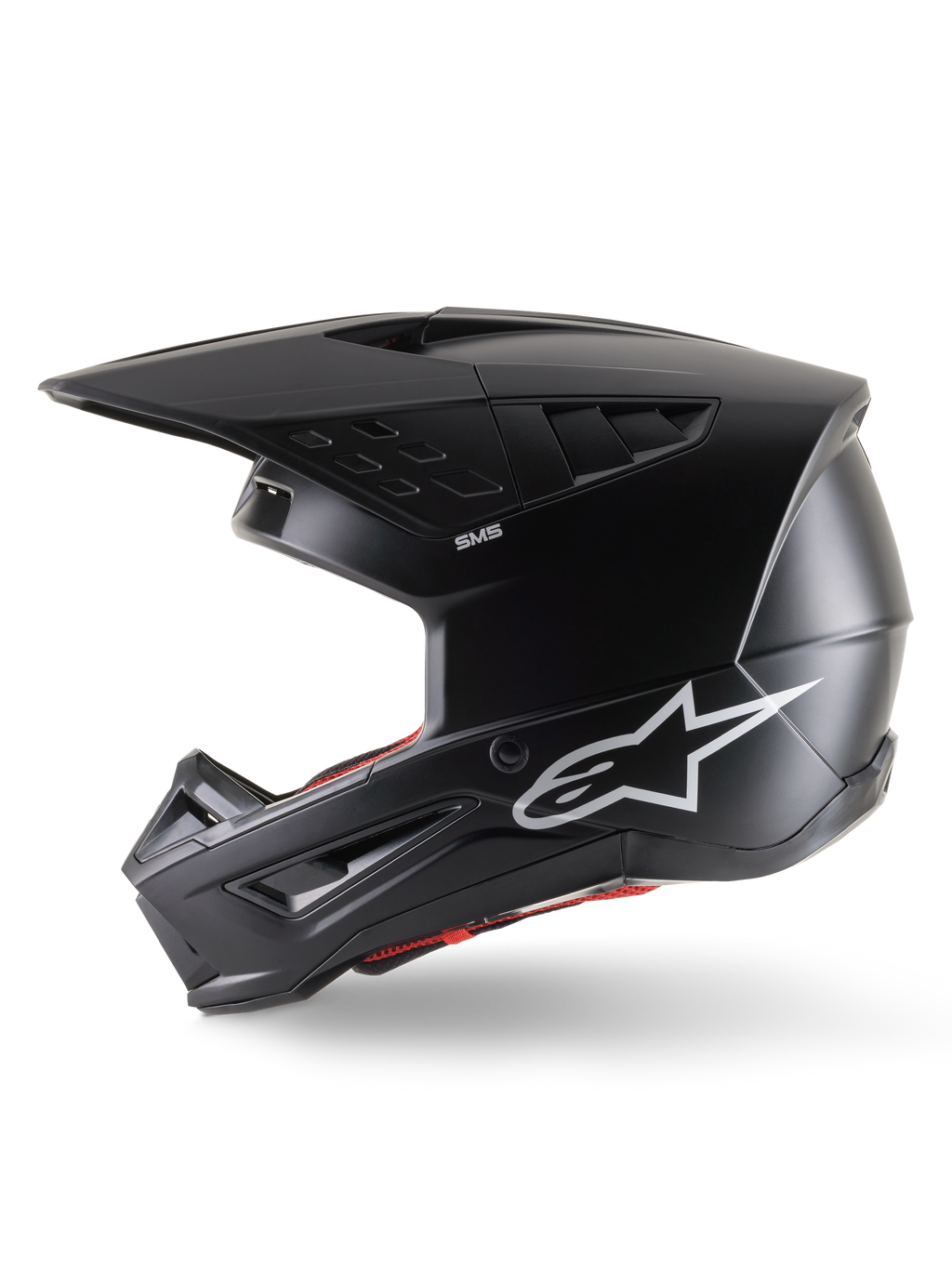 Alpinestars S-M5 Solid Helmet ECE 22.06, Motocross Helmet, Black Matt, side profile view featuring a sleek matte finish, white Alpinestars logo on the side, red interior padding, and aerodynamic shell with integrated ventilation ports