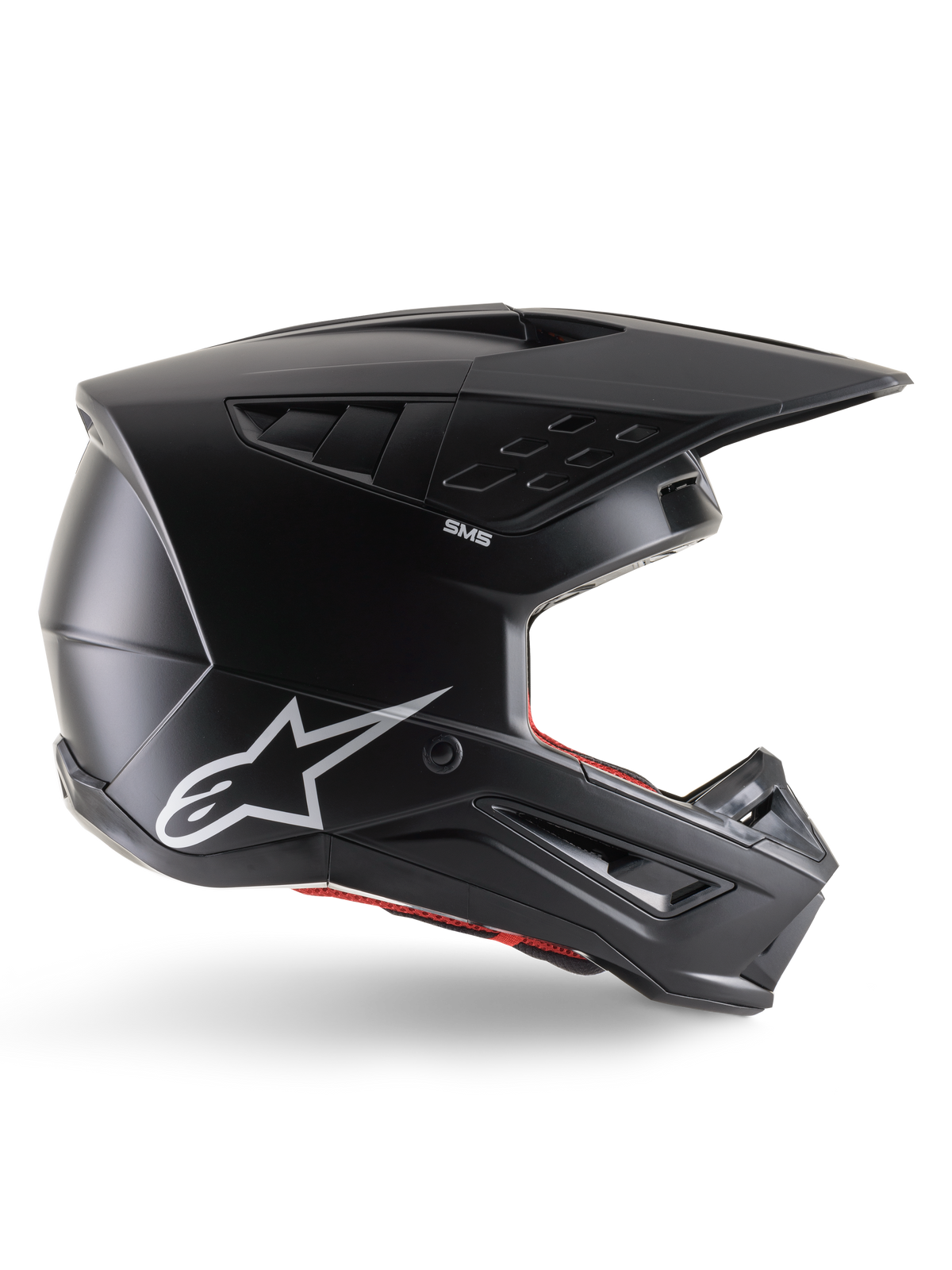 Alpinestars S-M5 Solid Helmet, Motocross Helmet, Matte Black, featuring white Alpinestars star logo and red interior lining, aerodynamic design with multiple air vents and long visor, ECE 22.06 certified off-road protection